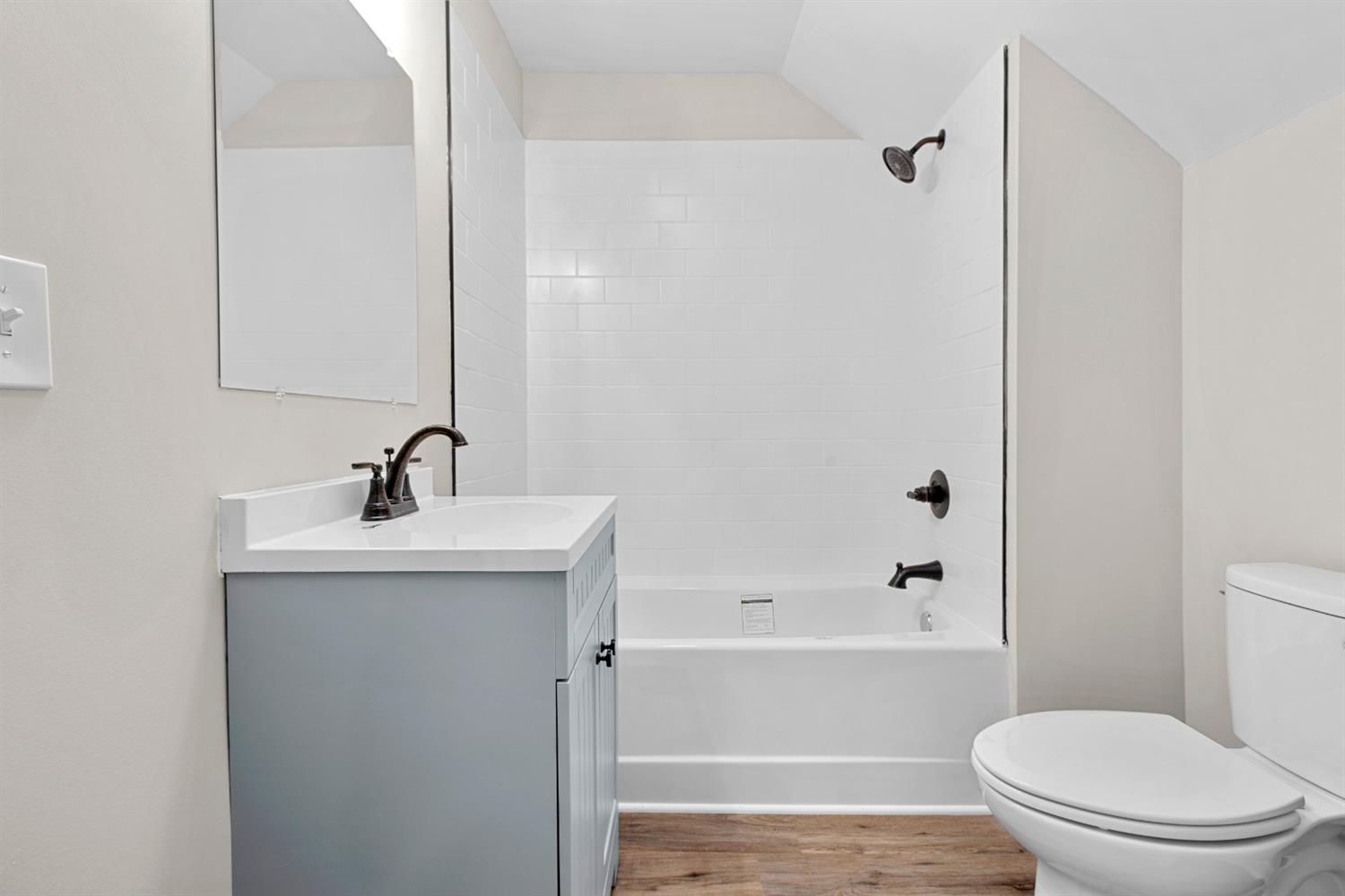 283 West Division Road Valparaiso, IN 46385 - Photo 15 of 17 a bathroom with a sink a toilet and shower