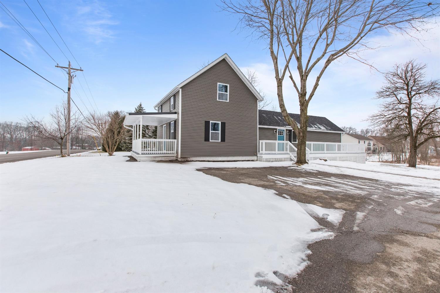 283 West Division Road Valparaiso, IN 46385 - Photo 2 of 17 a front view of a house with a yard