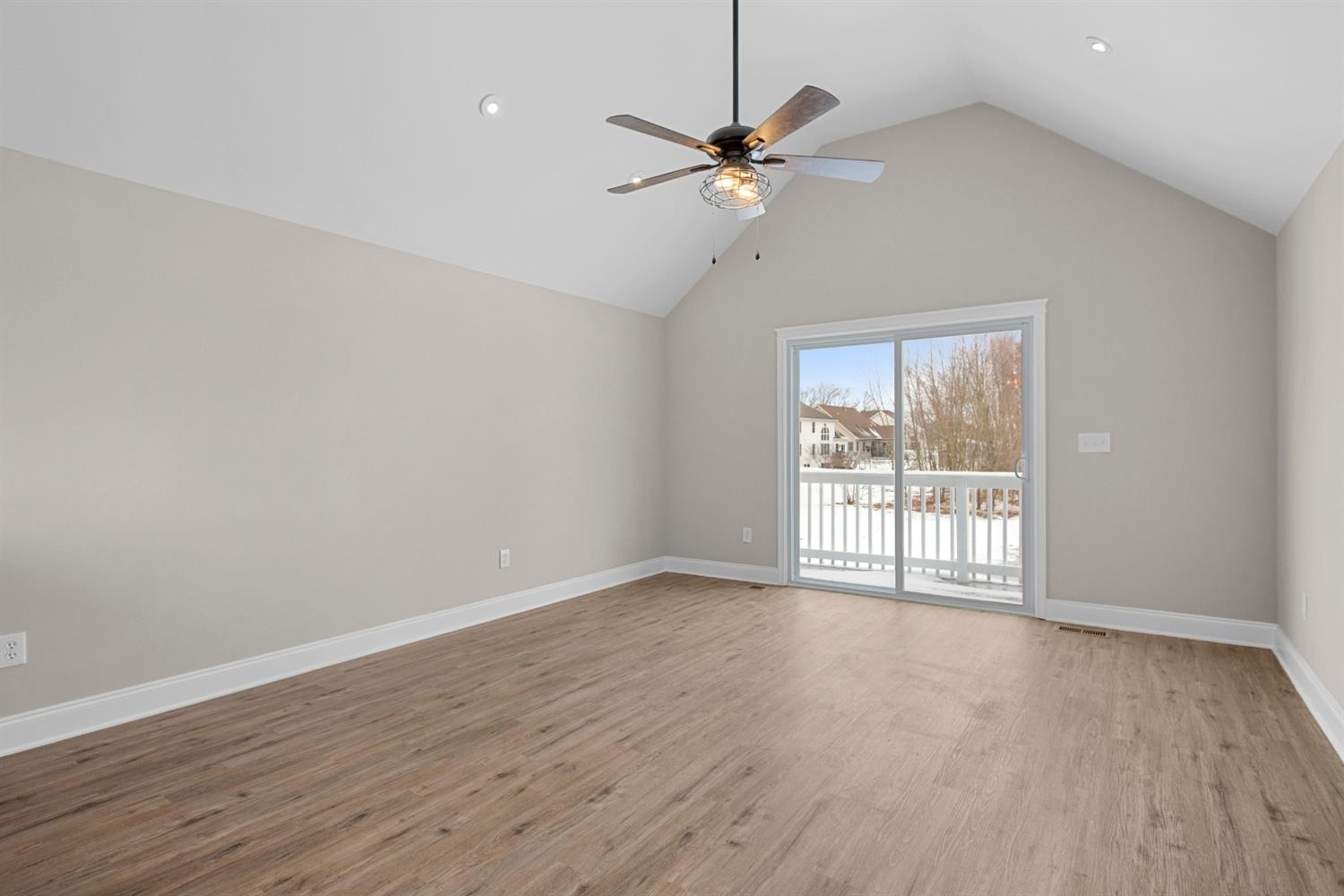 283 West Division Road Valparaiso, IN 46385 - Photo 6 of 17 a view of an empty room with wooden floor and a window