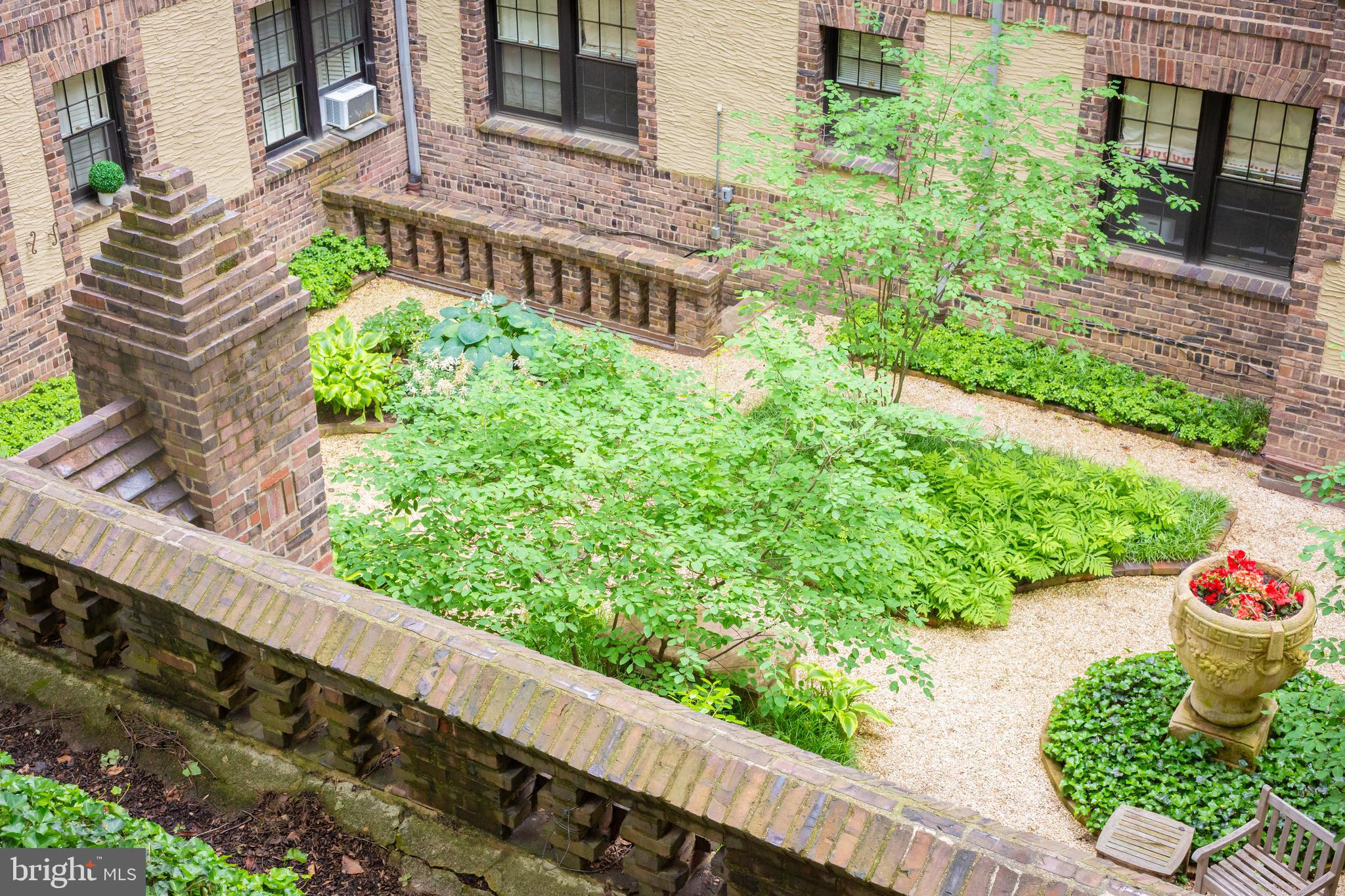 3900 Connecticut Avenue Northwest, Unit 306F Washington, DC 20008 - Photo 27 of 33 a front view of a house with a yard