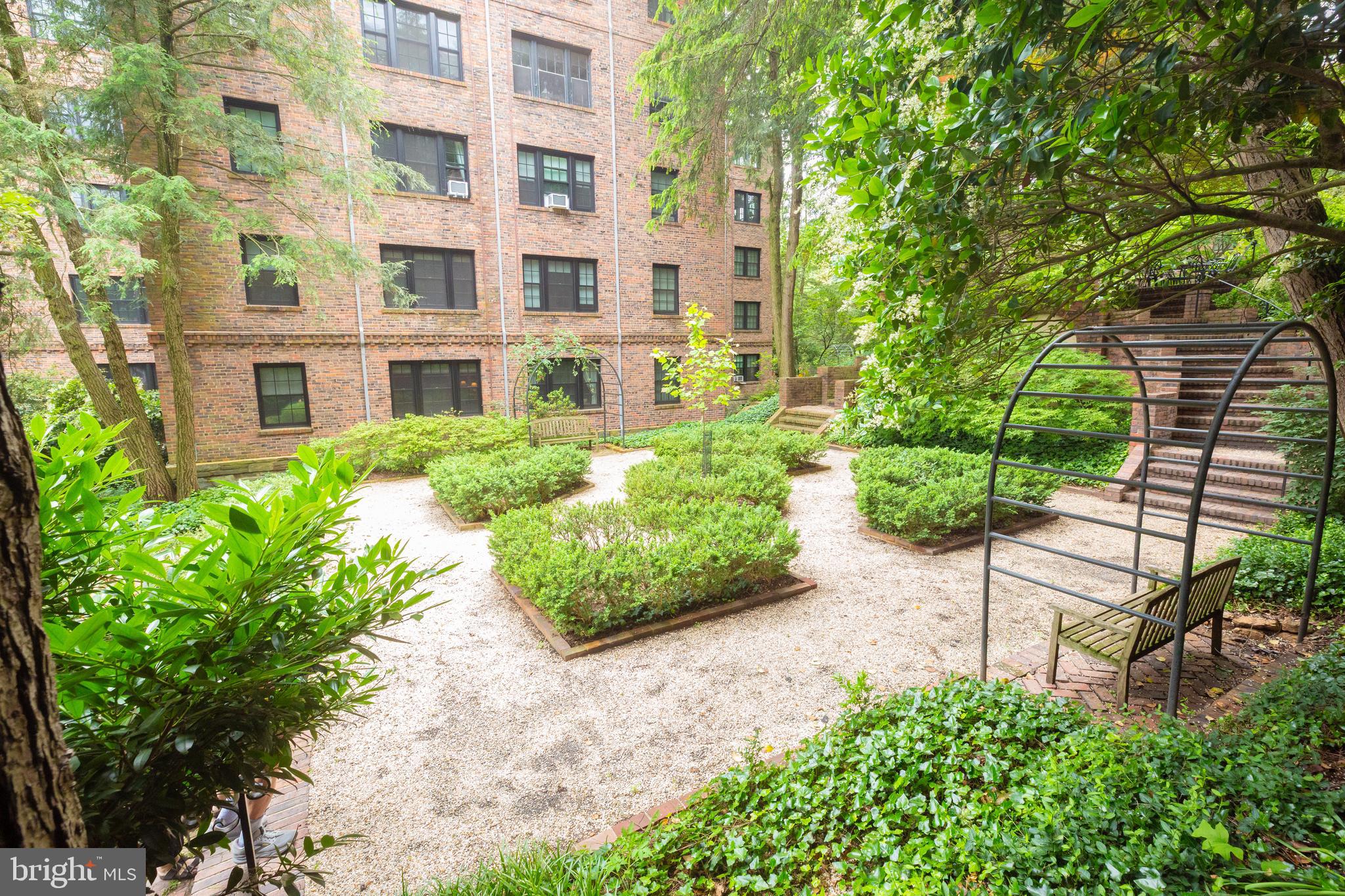 3900 Connecticut Avenue Northwest, Unit 306F Washington, DC 20008 - Photo 31 of 33 a view of backyard of house with a garden