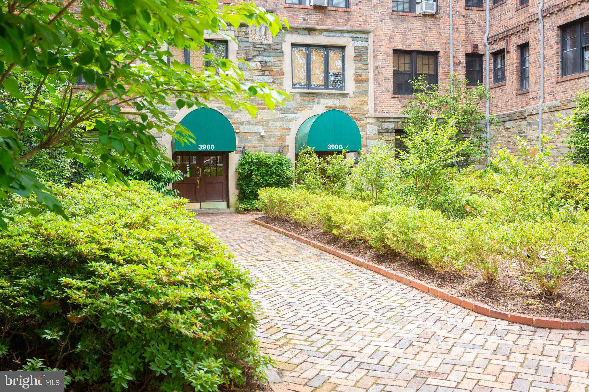 3900 Connecticut Avenue Northwest, Unit 306F Washington, DC 20008 - Photo 33 of 33 a front view of a house with a yard