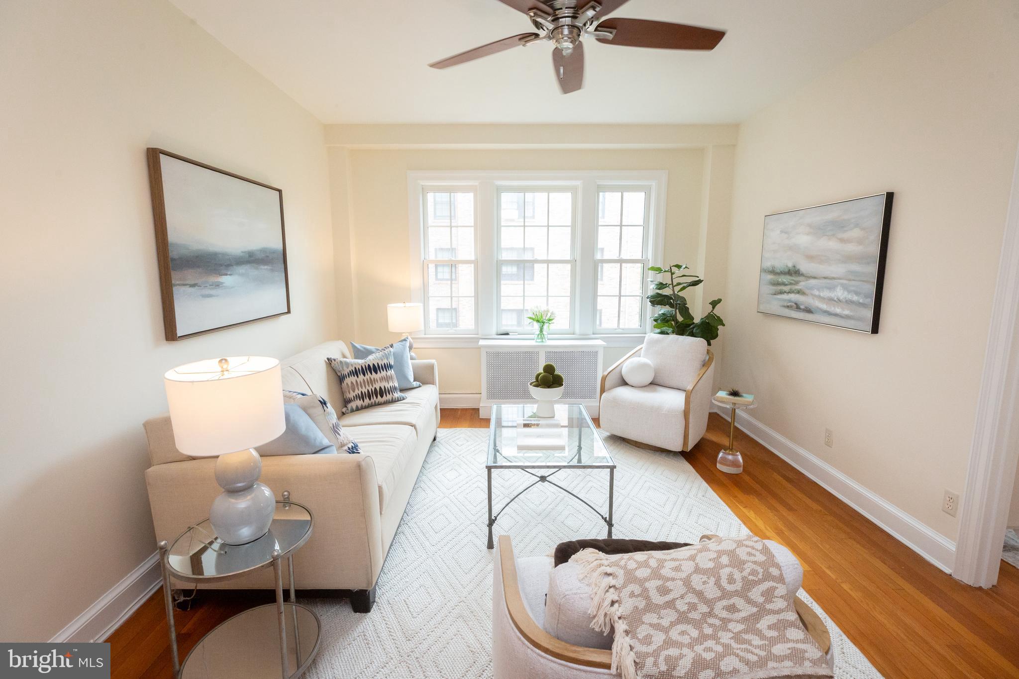 3900 Connecticut Avenue Northwest, Unit 306F Washington, DC 20008 - Photo 6 of 33 a living room with furniture and a window