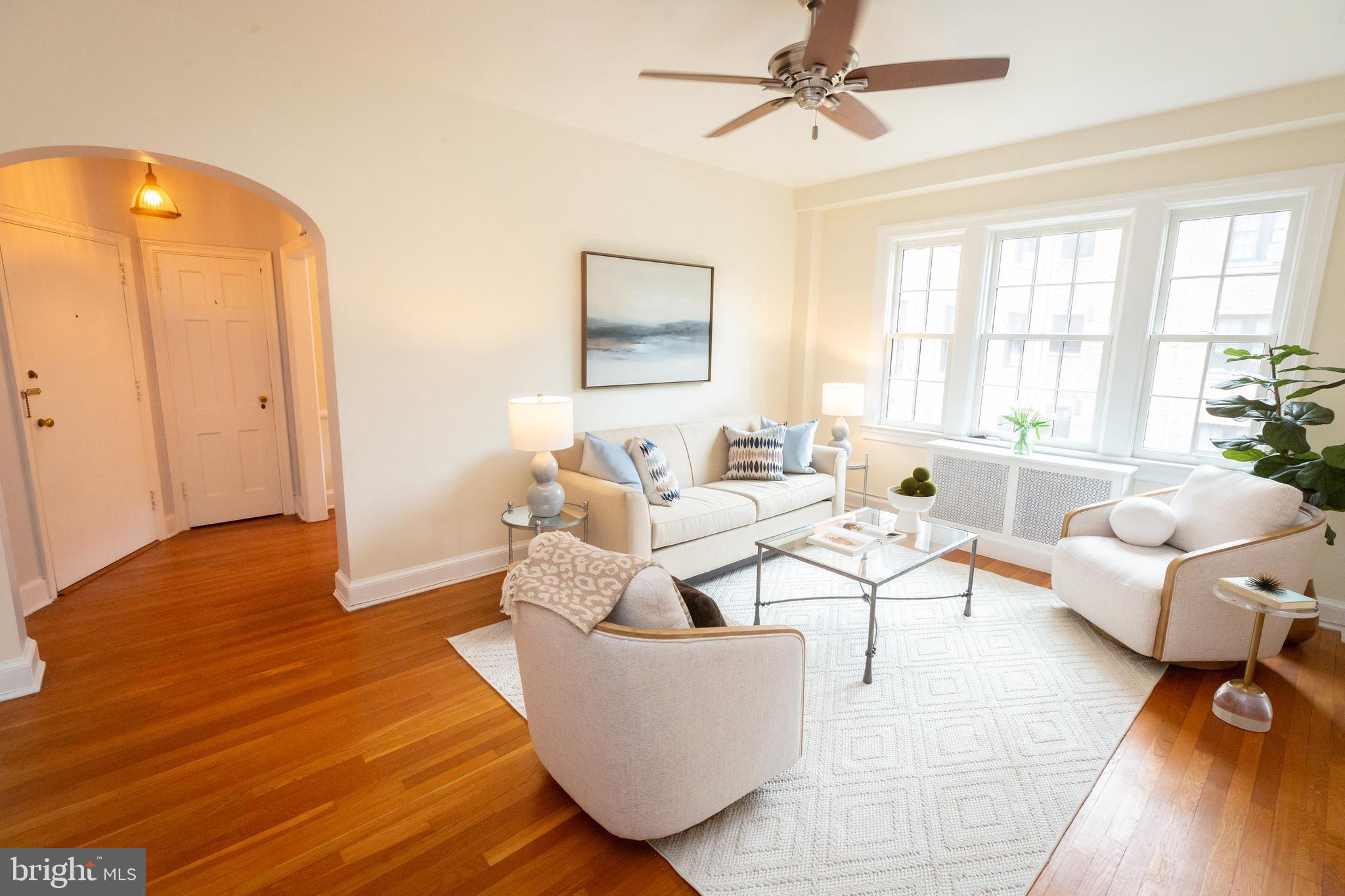 3900 Connecticut Avenue Northwest, Unit 306F Washington, DC 20008 - Photo 7 of 33 a living room with furniture and a window