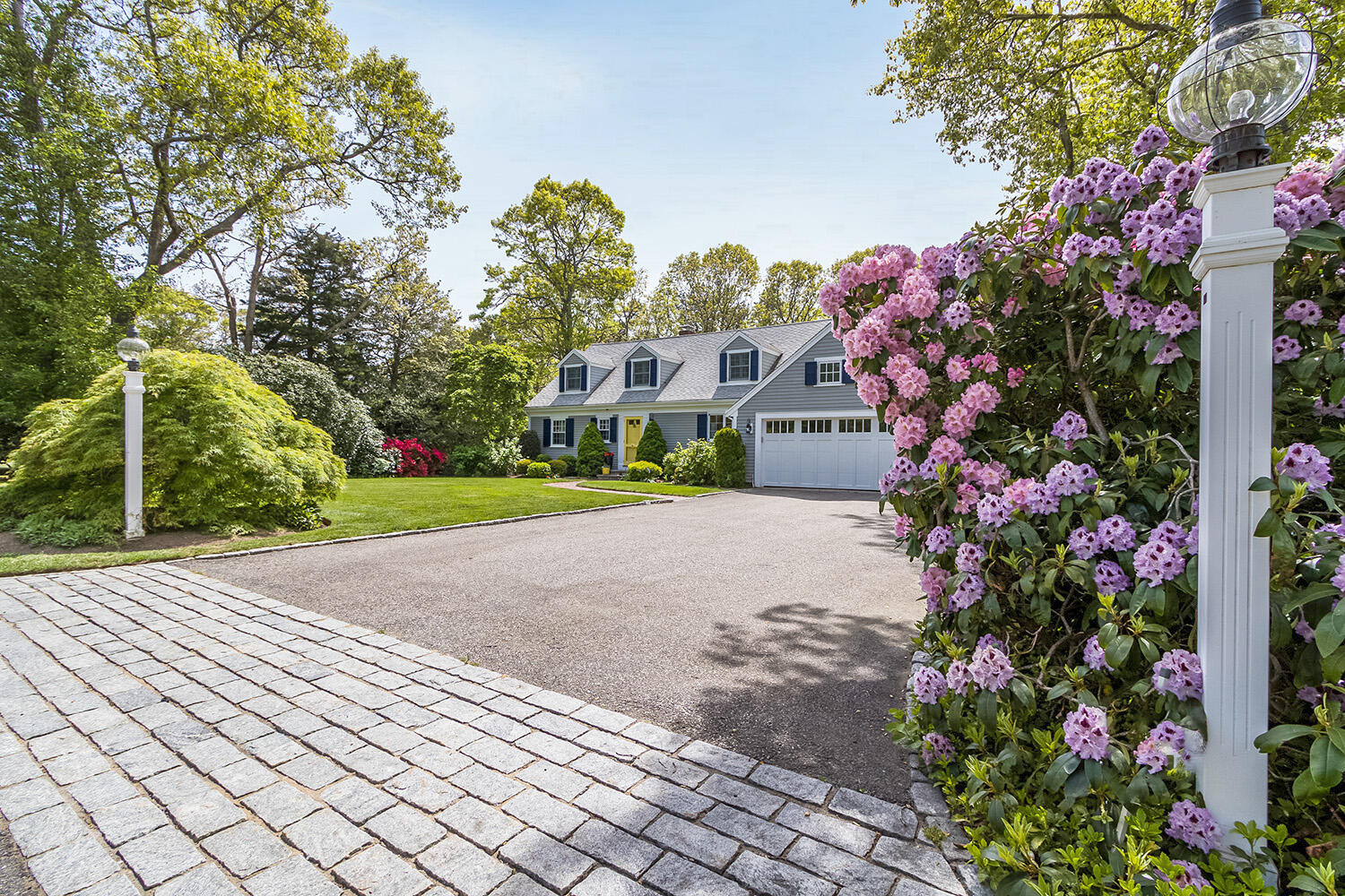 243 Parker Road Osterville, MA 02655 - Photo 1 of 34 a view of a garden with flowers