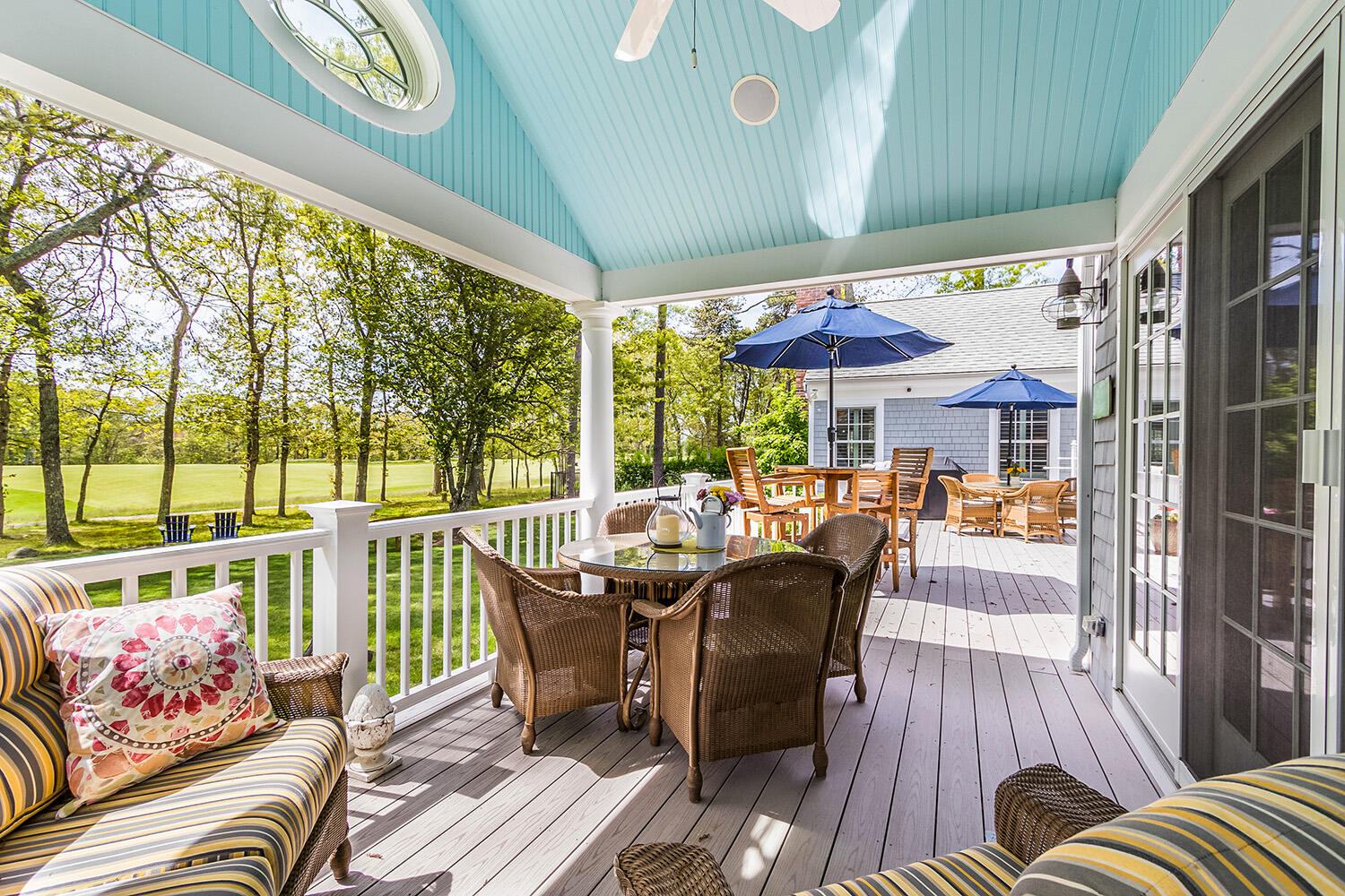 243 Parker Road Osterville, MA 02655 - Photo 29 of 34 a view of a patio with table and chairs potted plants with wooden floor