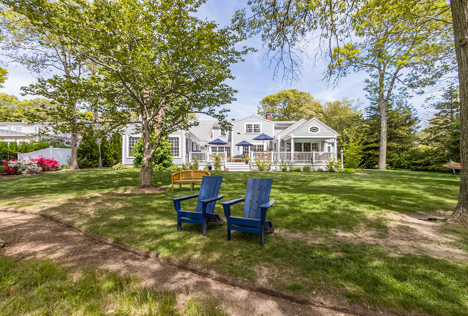 243 Parker Road Osterville, MA 02655 - Photo 3 of 34 a view of a house with a yard porch and sitting area