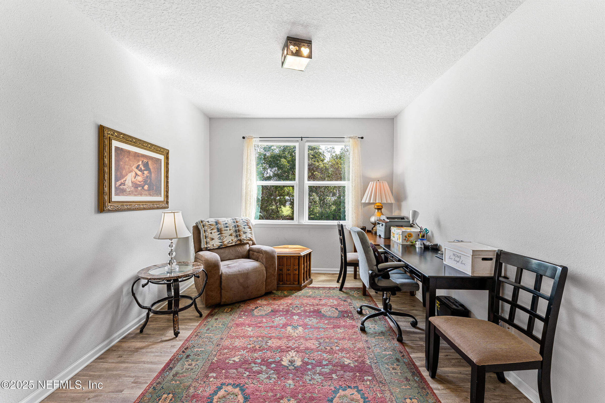 463 Tumbled Stone Way St. Augustine, FL 32086 - Photo 17 of 71 a living room with furniture and a window
