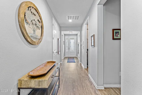 a view of a hallway with elevator