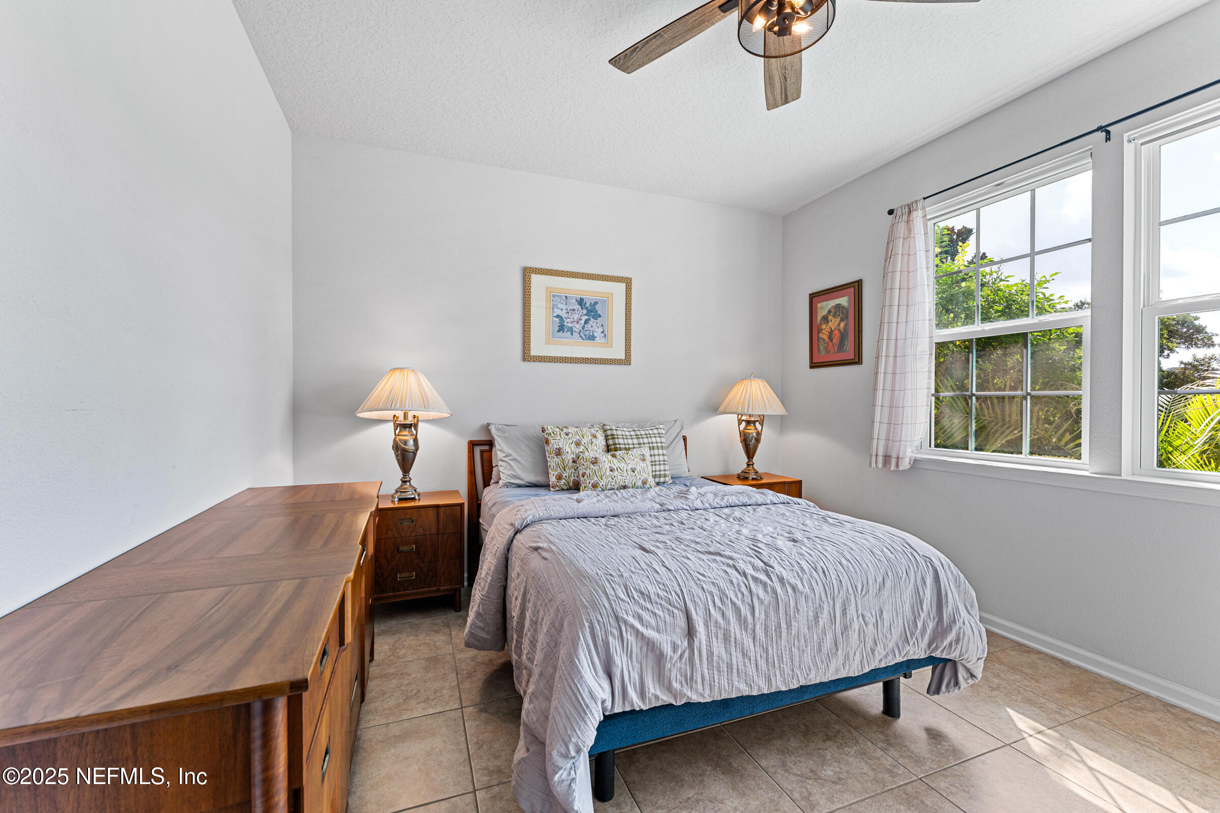 463 Tumbled Stone Way St. Augustine, FL 32086 - Photo 43 of 71 a bedroom with a bed and window