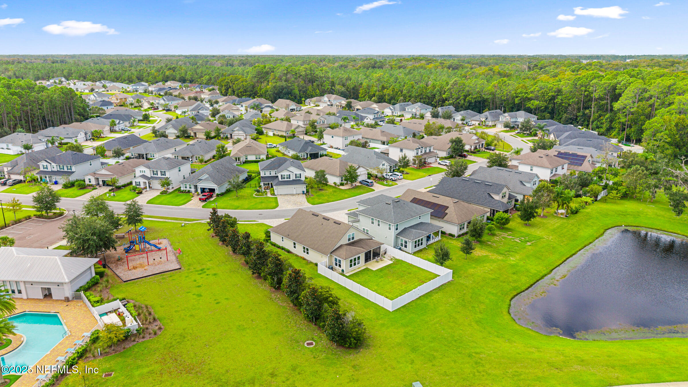 463 Tumbled Stone Way St. Augustine, FL 32086 - Photo 50 of 71 an aerial view of a house with a swimming pool yard and outdoor seating