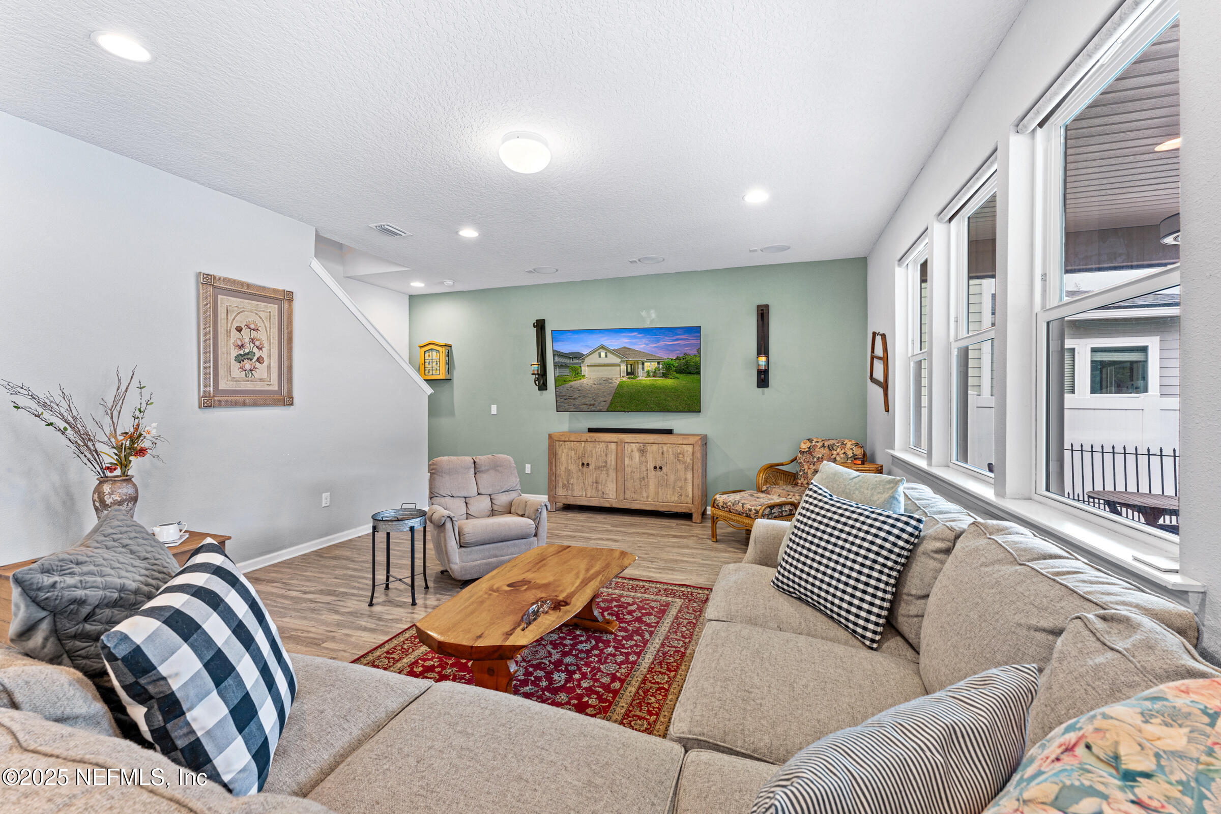 463 Tumbled Stone Way St. Augustine, FL 32086 - Photo 5 of 71 a bedroom with furniture and a couch