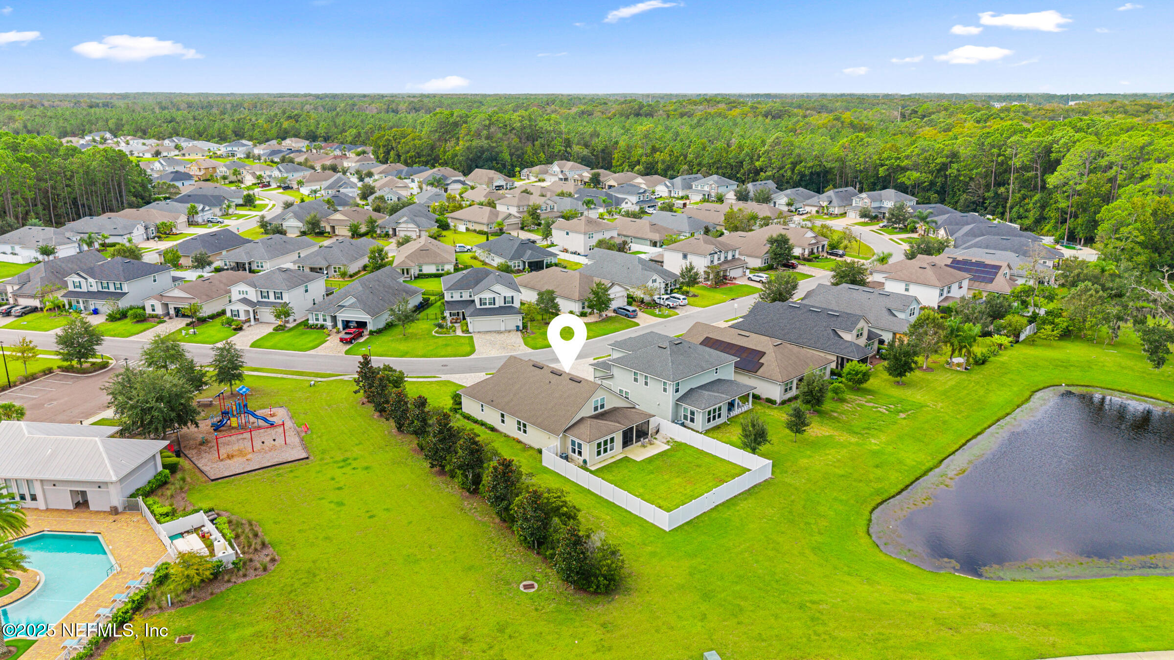 463 Tumbled Stone Way St. Augustine, FL 32086 - Photo 51 of 71 an aerial view of a house with a swimming pool yard and outdoor seating