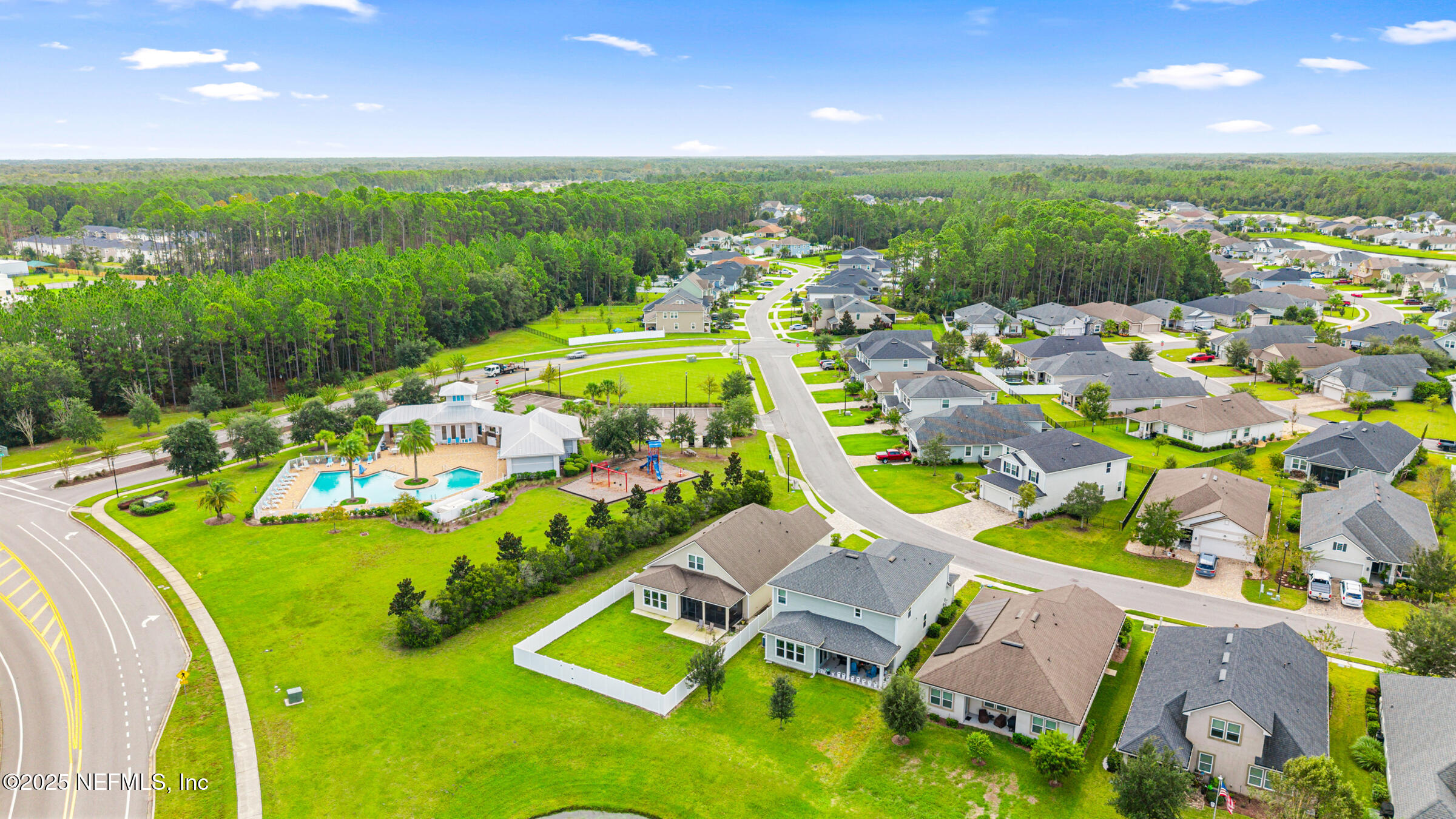 463 Tumbled Stone Way St. Augustine, FL 32086 - Photo 52 of 71 an aerial view of a house with a swimming pool yard and outdoor seating