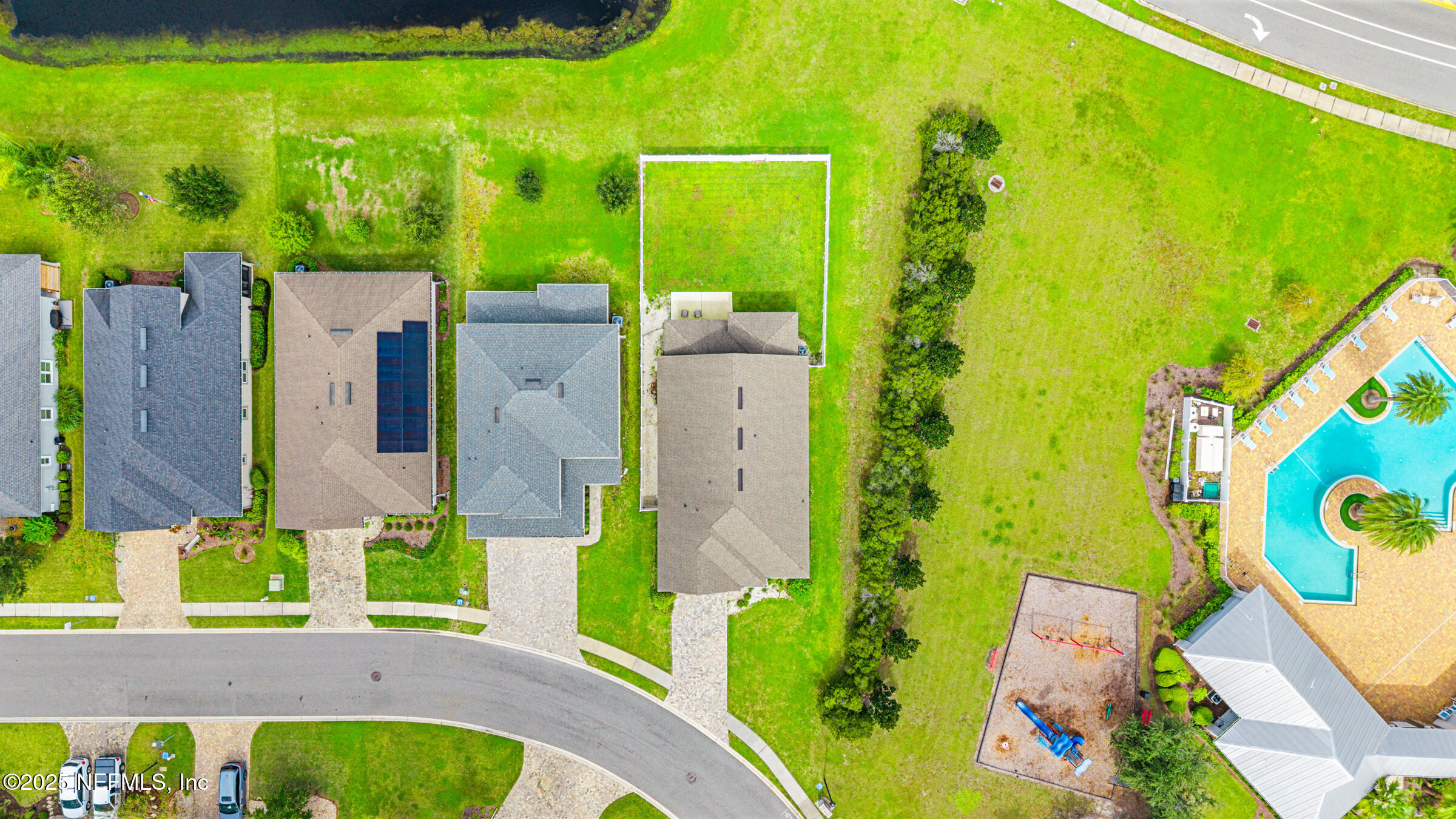 463 Tumbled Stone Way St. Augustine, FL 32086 - Photo 58 of 71 an aerial view of a house with a swimming pool