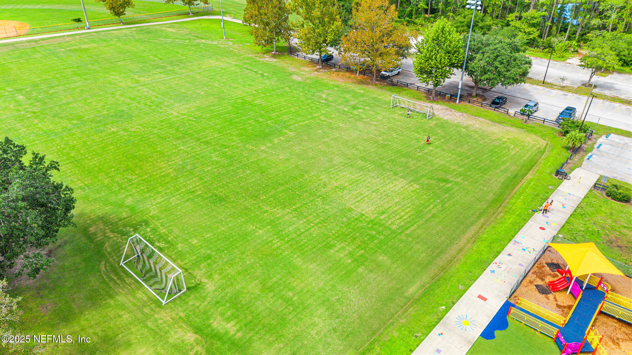 463 Tumbled Stone Way St. Augustine, FL 32086 - Photo 70 of 71 a view of an outdoor space and a yard
