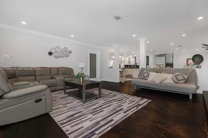 7475 Southwest 134th Street Pinecrest, FL 33156 - Photo 12 of 42 a living room with furniture and wooden floor