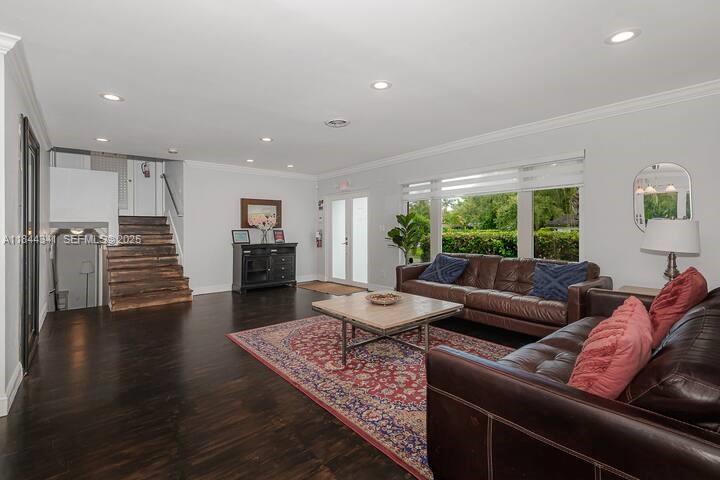 7475 Southwest 134th Street Pinecrest, FL 33156 - Photo 10 of 42 a living room with furniture and a wooden floor