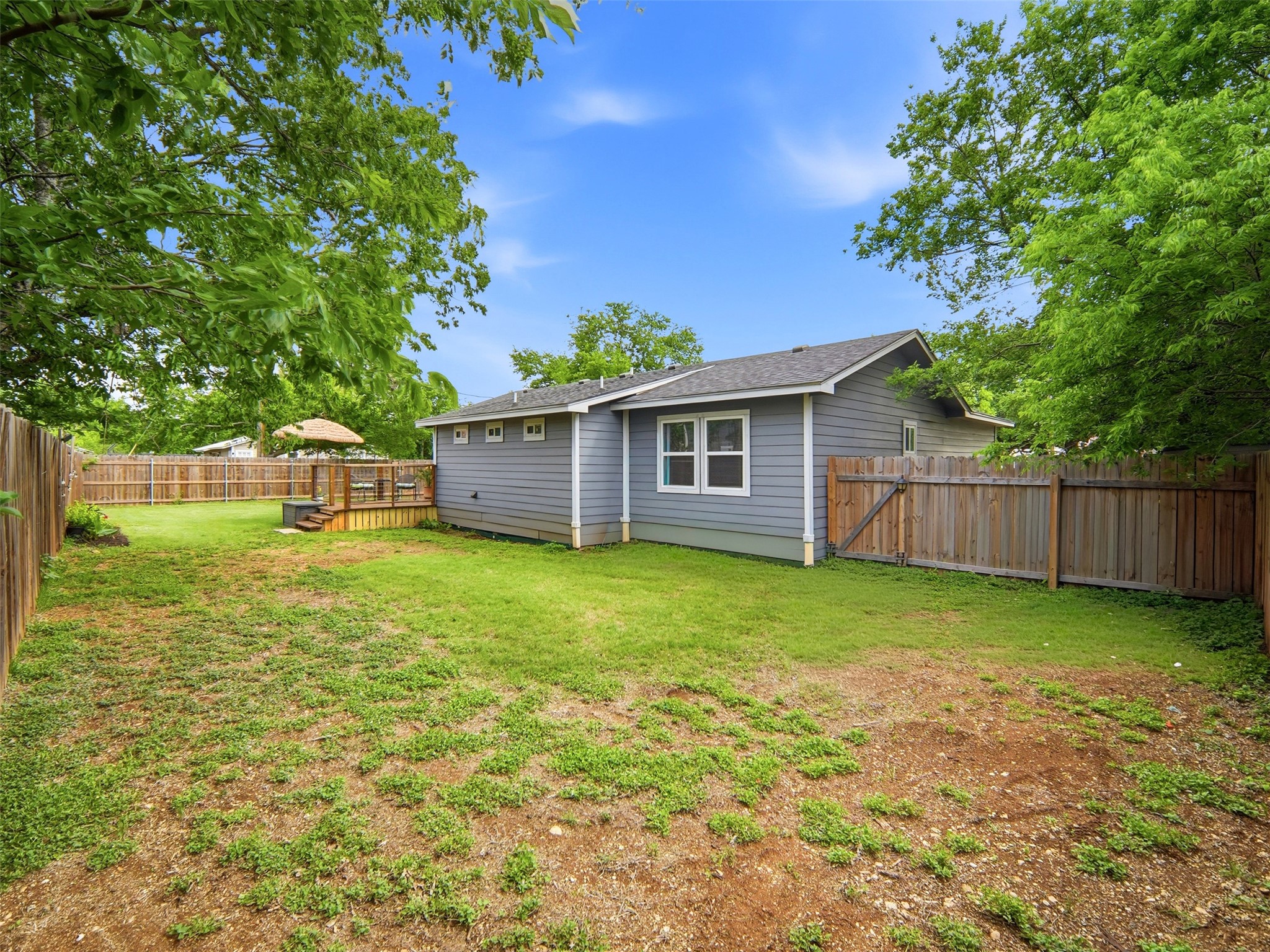 700 9th Street Blanco, TX 78606 - Photo 27 of 33 a backyard of a house with lots of green space
