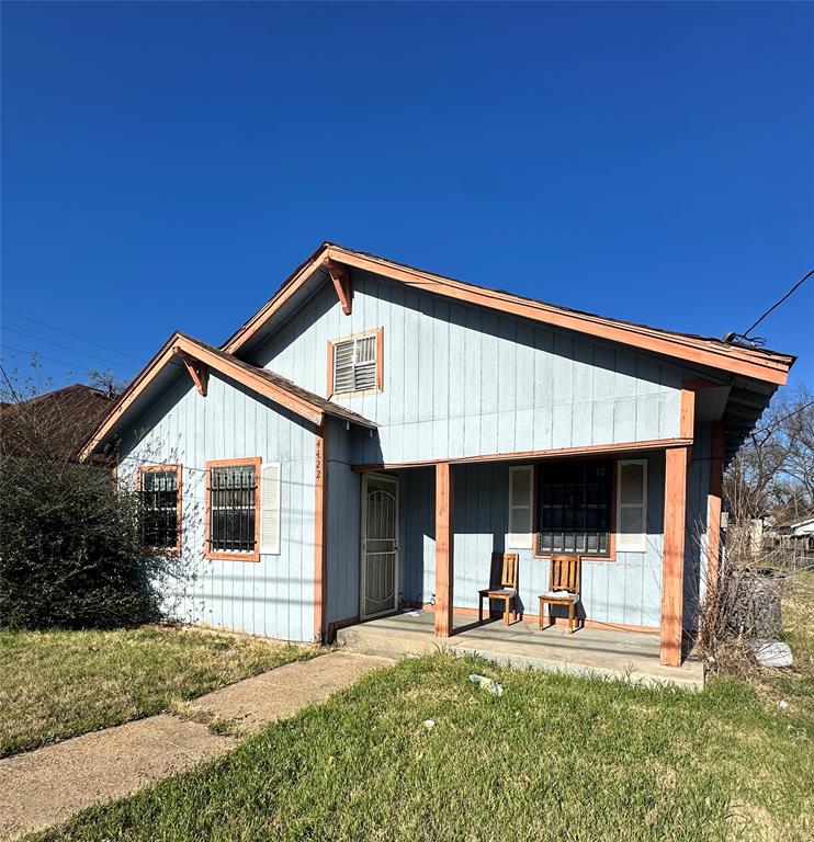 a front view of a house with a porch