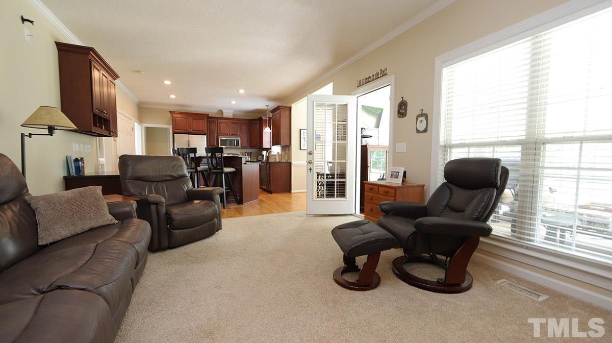 3820 Evander Way Raleigh, NC 27613 - Photo 16 of 30 A view of the from the family room through to the kitchen.