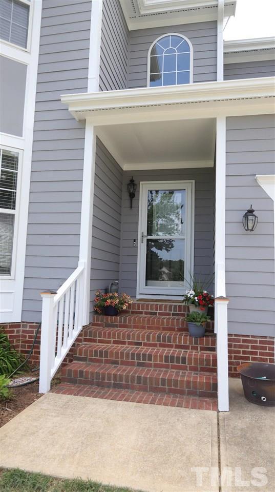 3820 Evander Way Raleigh, NC 27613 - Photo 3 of 30 It is great to have a covered entry to the home. There is a storm door as well.