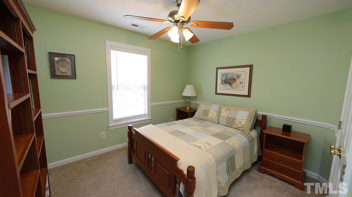 3820 Evander Way Raleigh, NC 27613 - Photo 23 of 30 The 3 secondary bedrooms are quite large and each has a fan.