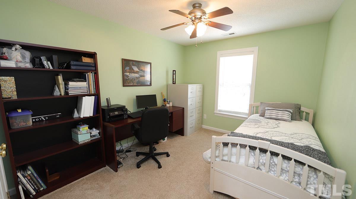 3820 Evander Way Raleigh, NC 27613 - Photo 24 of 30 This bedroom is being used as a guest room/office.