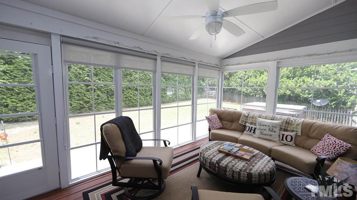 3820 Evander Way Raleigh, NC 27613 - Photo 27 of 30 The owners added EZ Breeze type windows to the screened porch to be able to enjoy the space year round. It is a cozy and relaxing extension to the home. There is a mount for a tv as well.