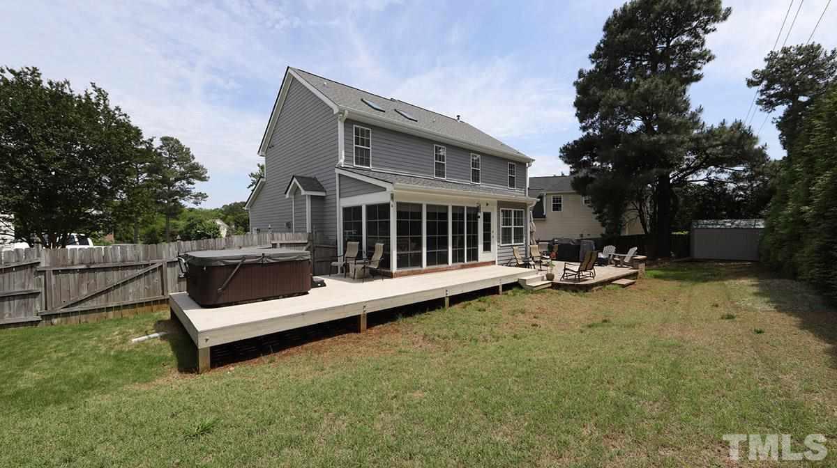 3820 Evander Way Raleigh, NC 27613 - Photo 29 of 30 Perhaps relax in the hot tub on the deck. The yard is fenced. Hot tub conveys as is.