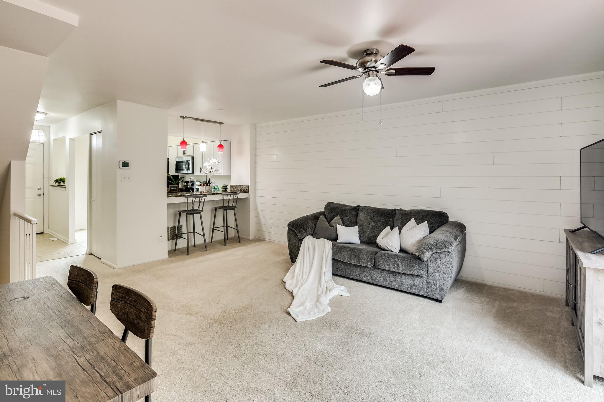 2418 Potterfield Road Windsor Mill, MD 21244 - Photo 13 of 37 Ceiling Fan | Family Area | Dining Space.