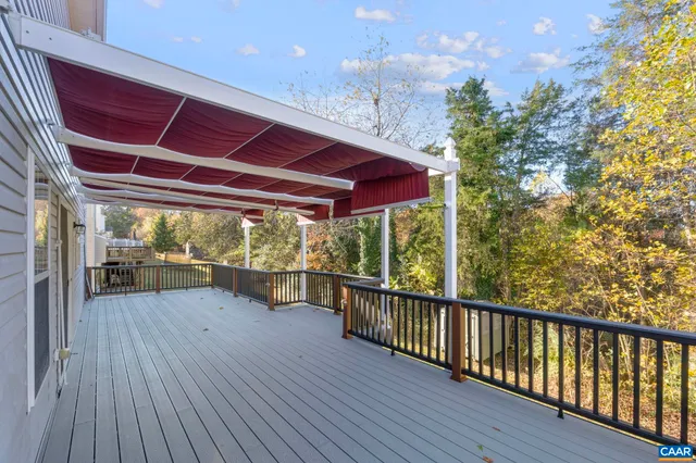 a view of porch with wooden floor