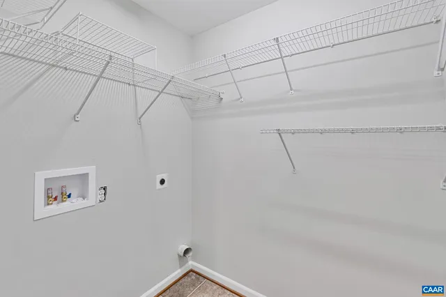 a view of a room with racks on the wall