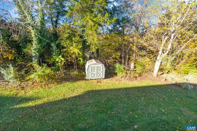 a view of the house with a swimming pool