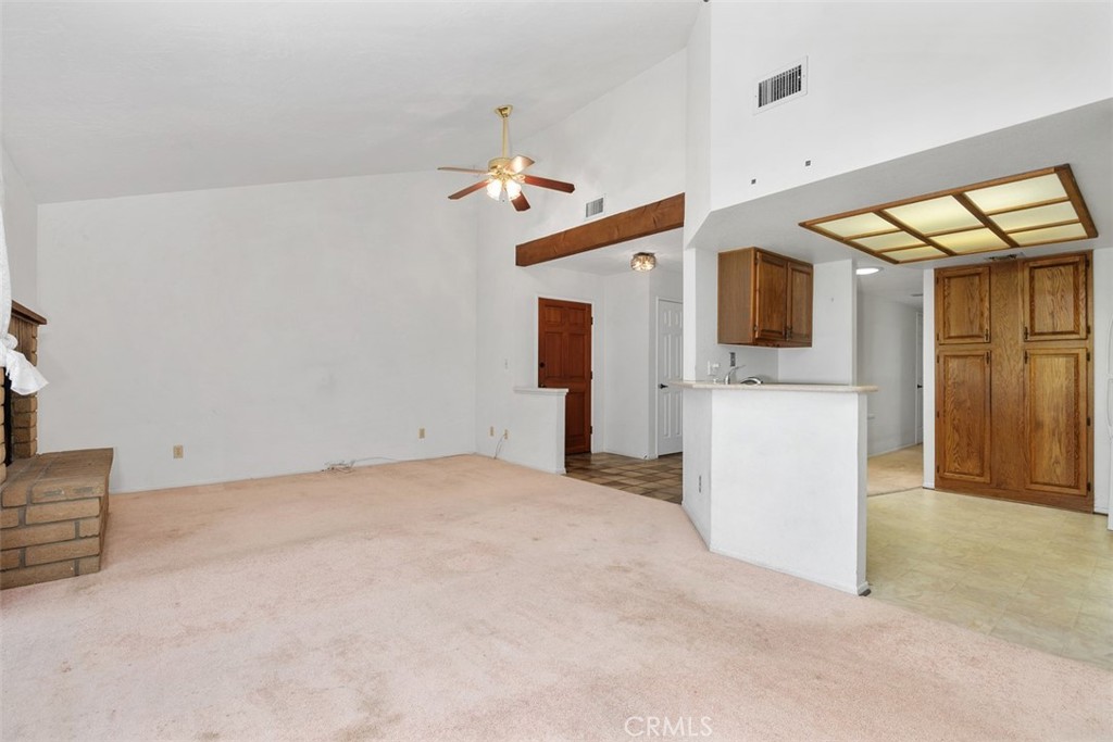 1744 Woodlark Lane Fallbrook, CA 92028 - Photo 16 of 38 a view of a livingroom with furniture and a flat screen tv
