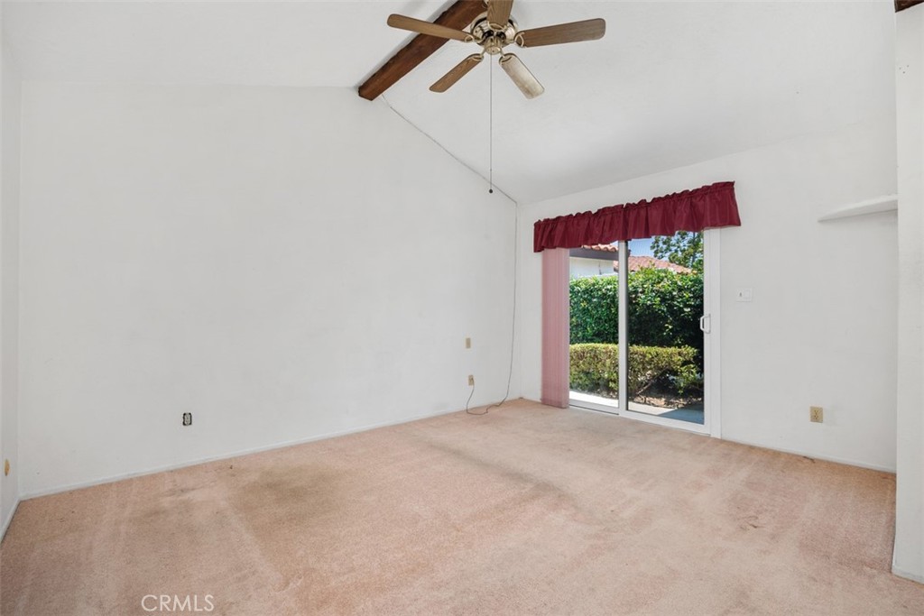 1744 Woodlark Lane Fallbrook, CA 92028 - Photo 21 of 38 a view of a room with a ceiling fan and a window