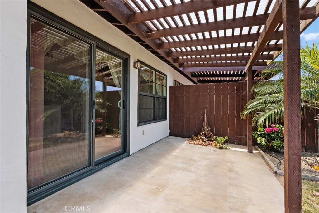 1744 Woodlark Lane Fallbrook, CA 92028 - Photo 30 of 38 a view of an entryway with a flower garden