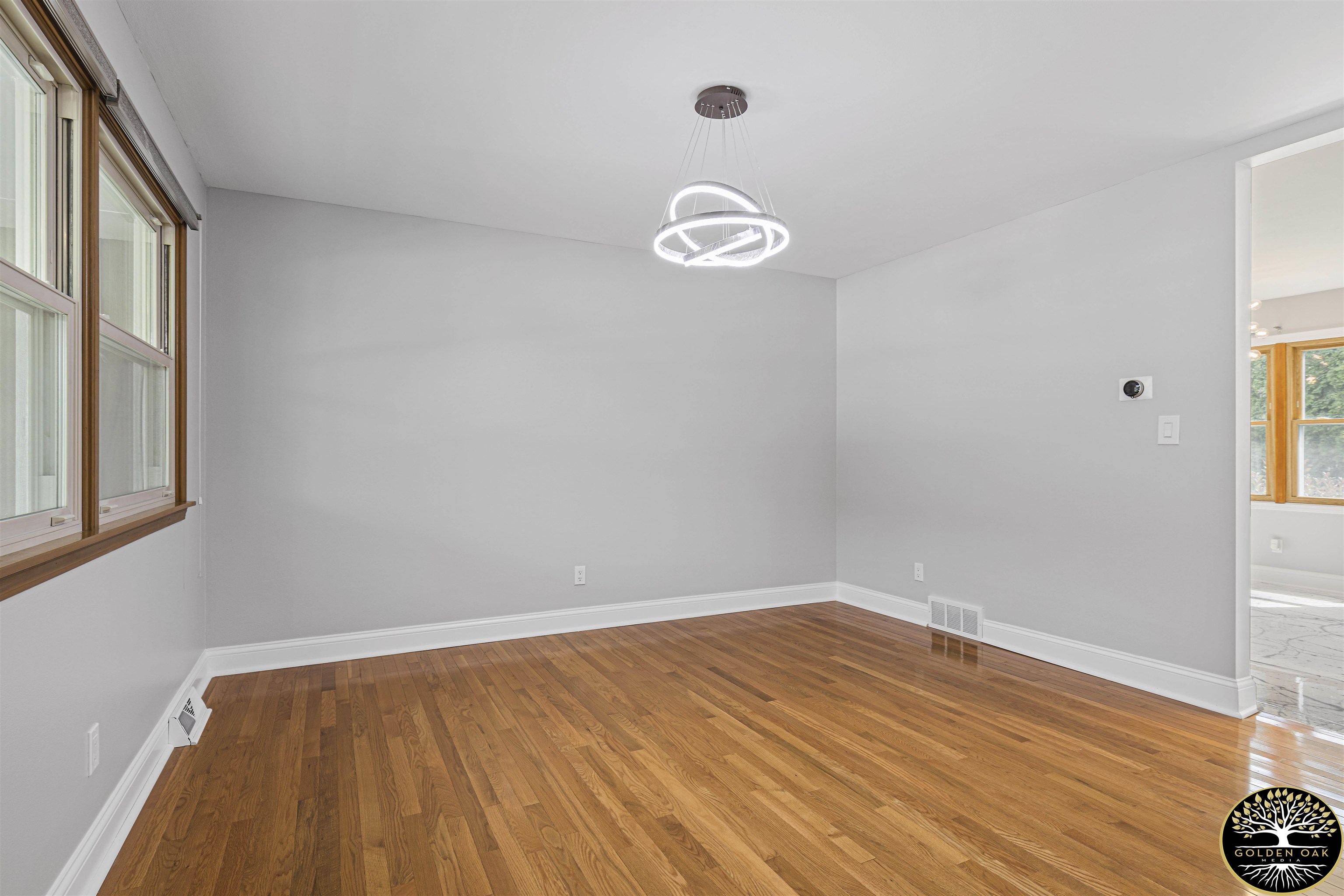 4951 Welsh Road Rockford, IL 61107 - Photo 16 of 45 a view of a room with wooden floor and window