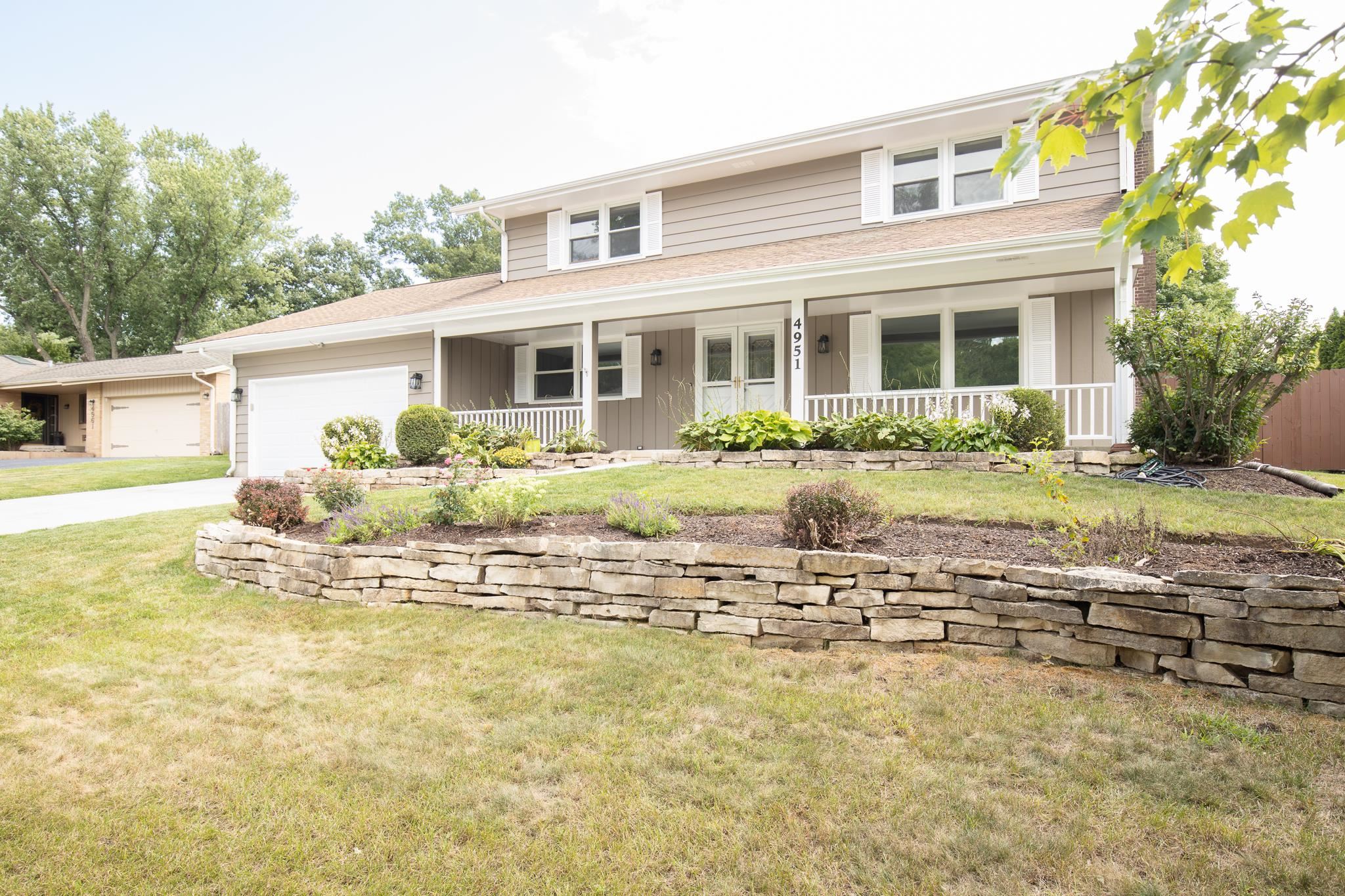 4951 Welsh Road Rockford, IL 61107 - Photo 2 of 45 a view of a house with a swimming pool