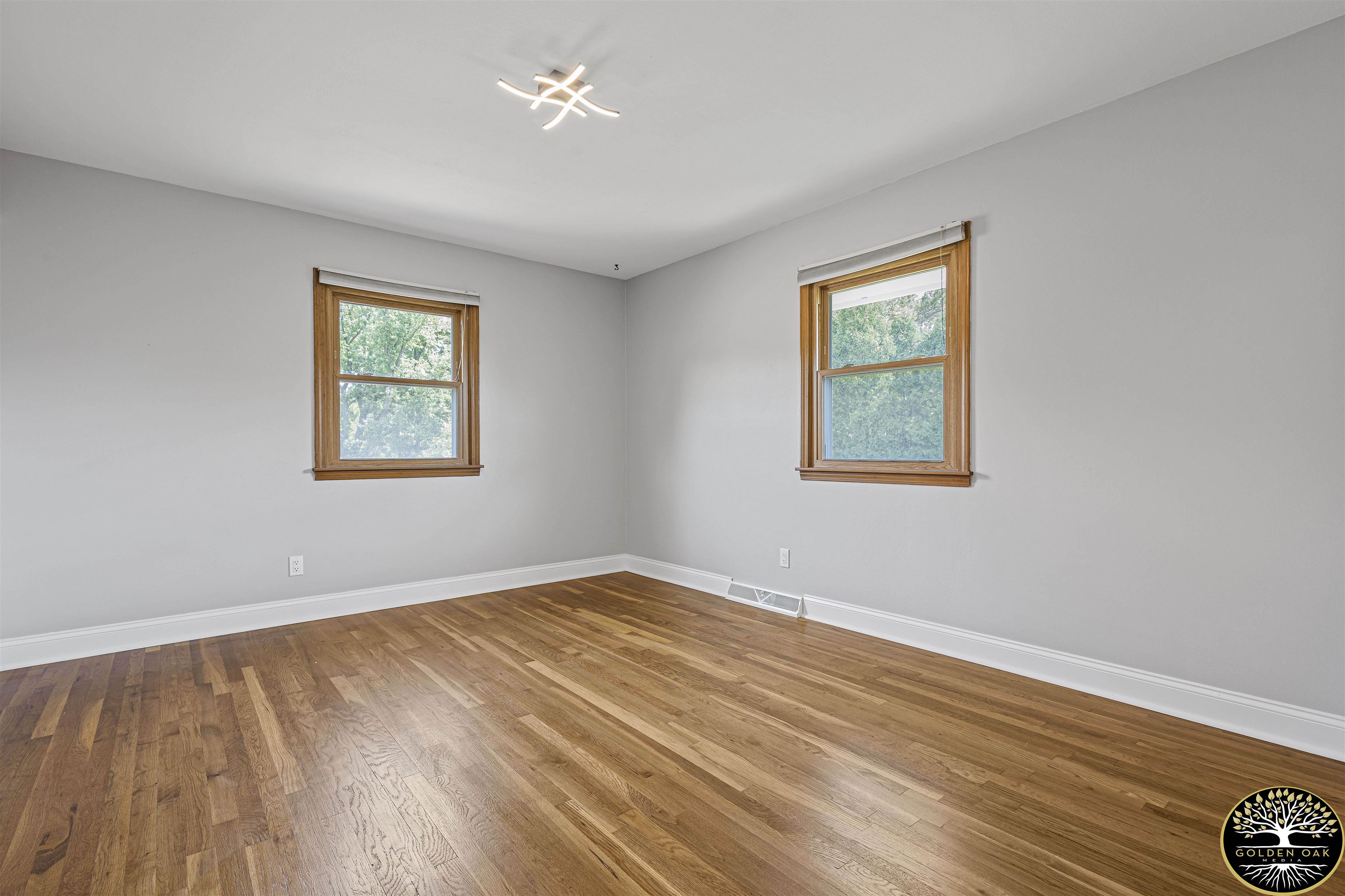 4951 Welsh Road Rockford, IL 61107 - Photo 25 of 45 a view of empty room with wooden floor and fan