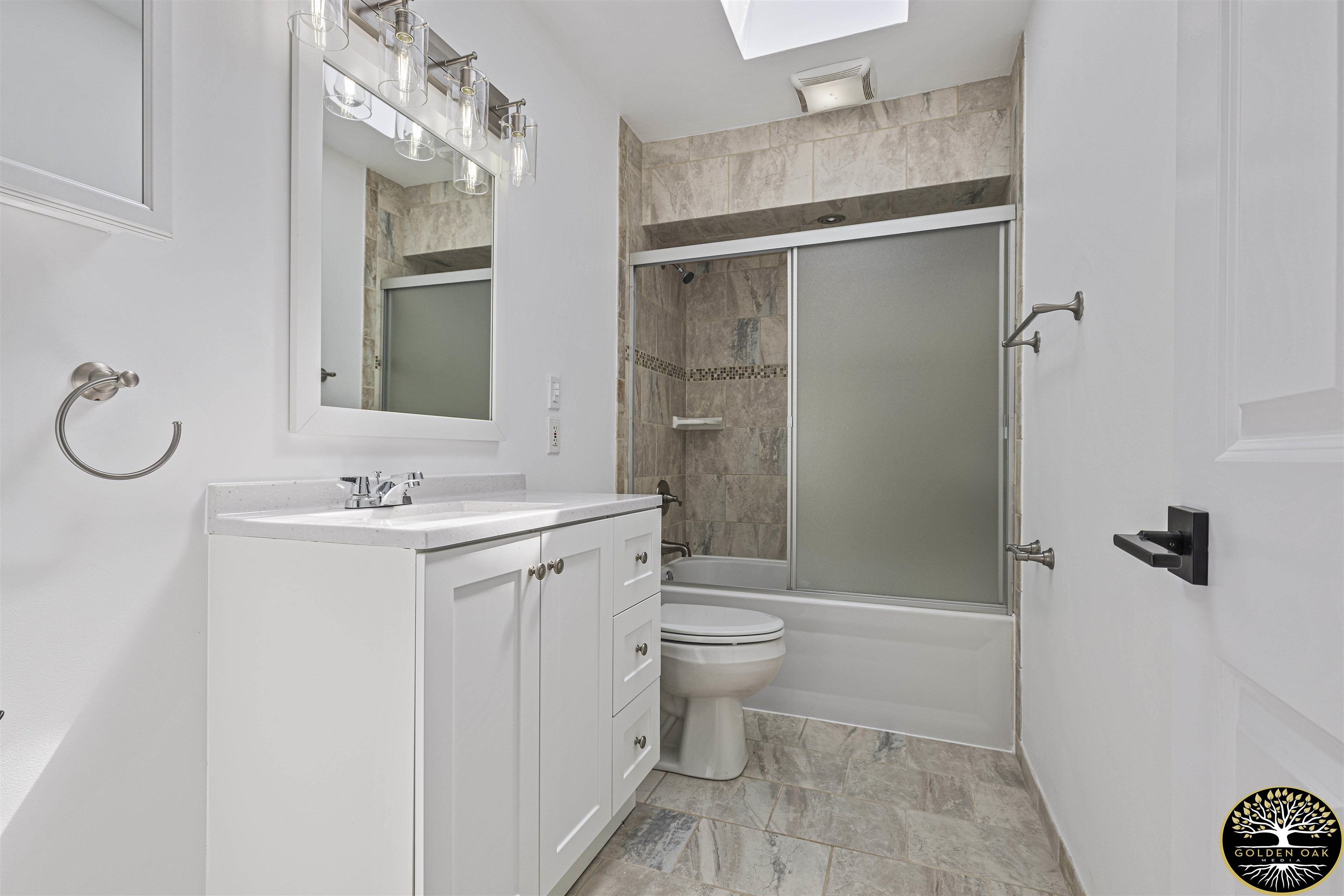 4951 Welsh Road Rockford, IL 61107 - Photo 27 of 45 a bathroom with a granite countertop sink toilet and shower