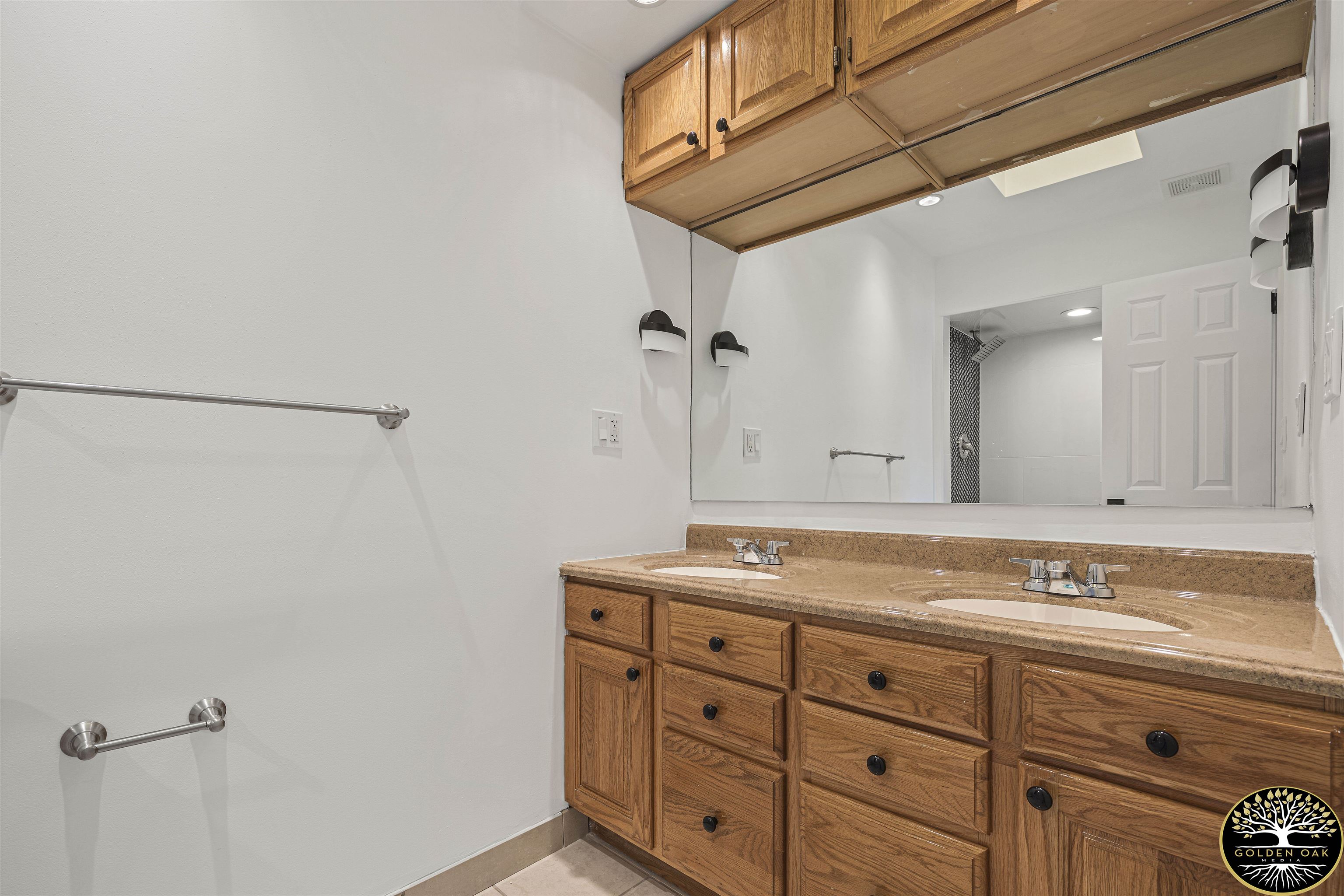 4951 Welsh Road Rockford, IL 61107 - Photo 30 of 45 a bathroom with a sink and a mirror