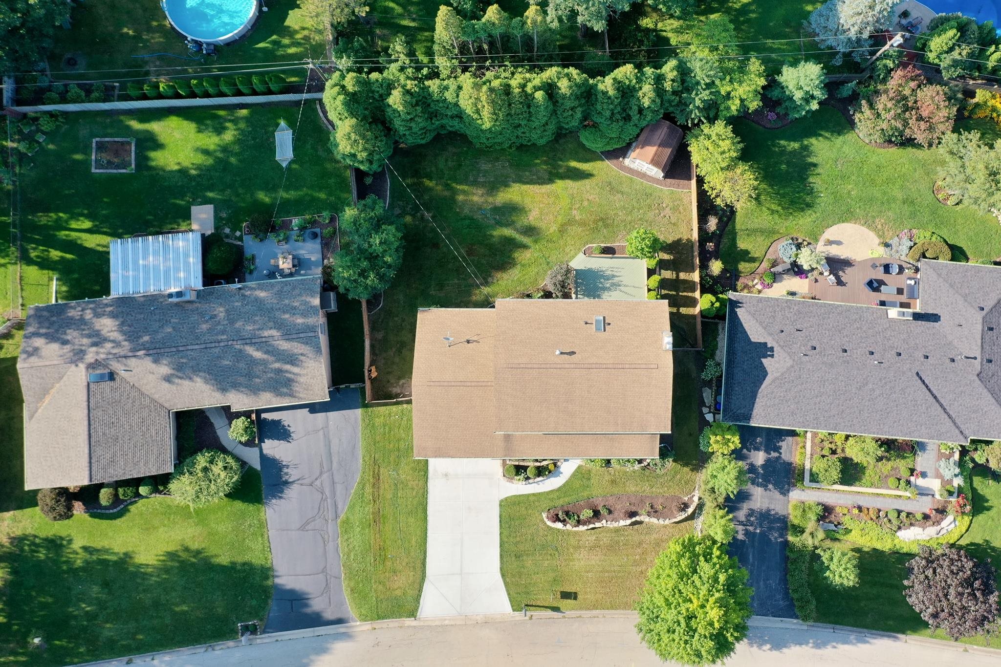 4951 Welsh Road Rockford, IL 61107 - Photo 6 of 45 an aerial view of a house with a garden