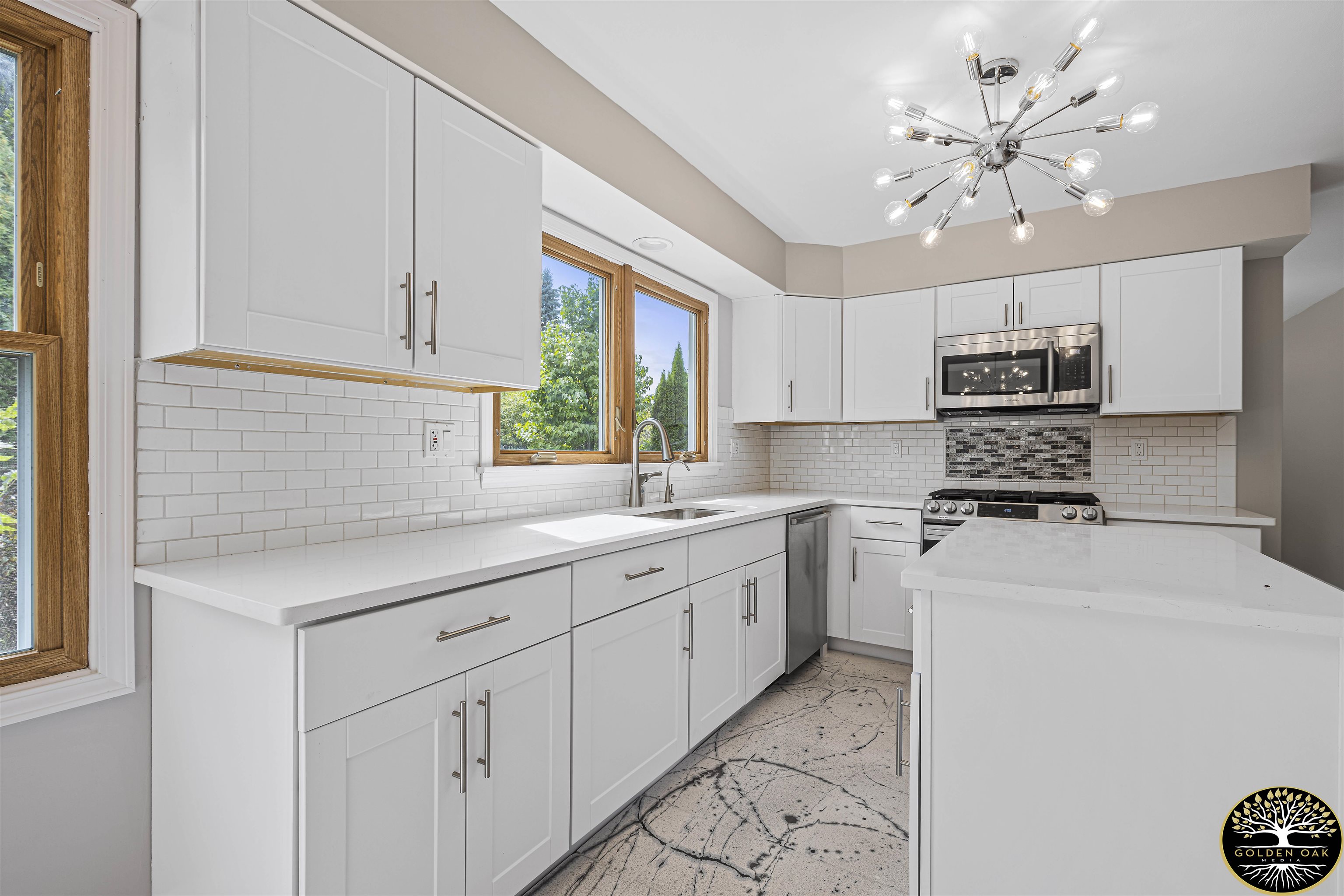 4951 Welsh Road Rockford, IL 61107 - Photo 10 of 45 a kitchen with sink cabinets and window