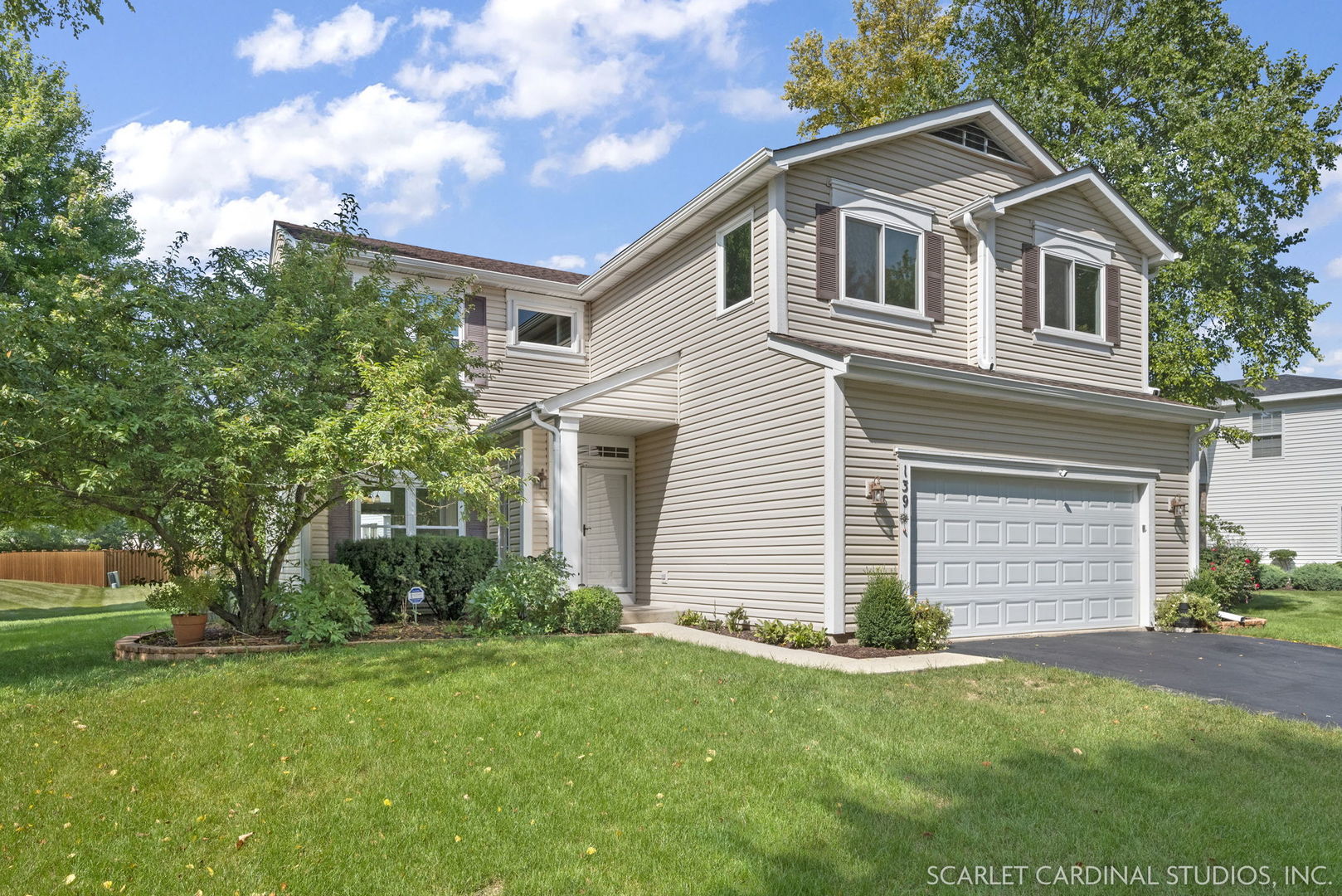139 Saffron Lane Bolingbrook, IL 60490 - Photo 1 of 1 a front view of a house with a garden
