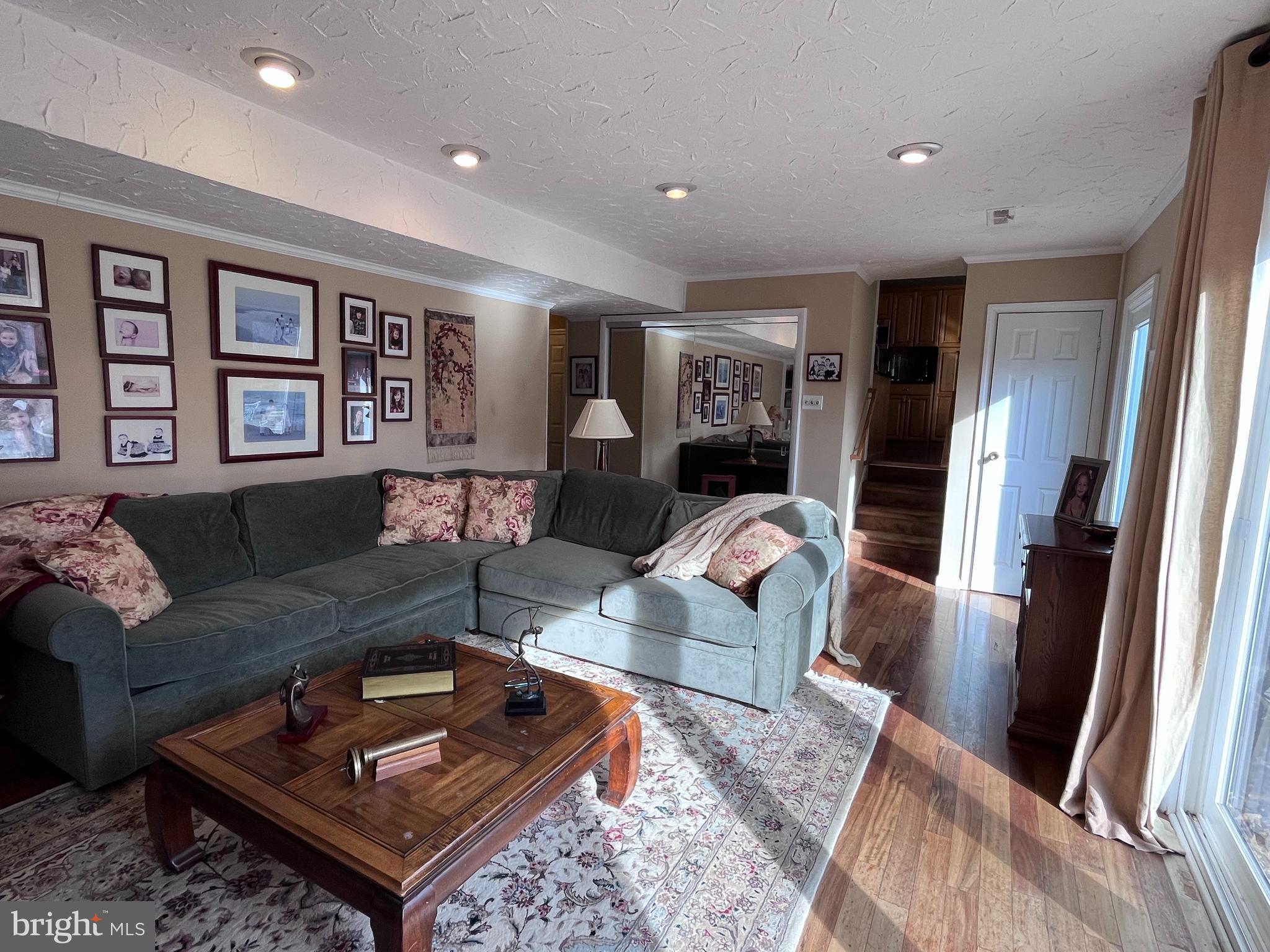 145 Joanne Road Holland, PA 18966 - Photo 16 of 54 a living room with furniture and a rug