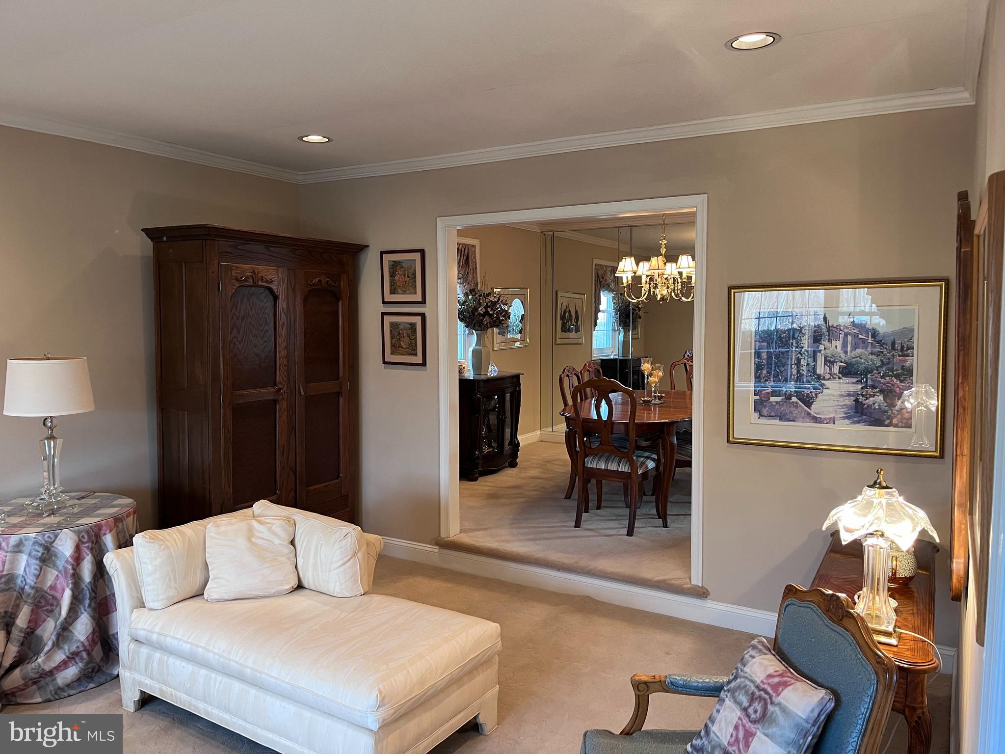 145 Joanne Road Holland, PA 18966 - Photo 28 of 54 a living room with furniture and a chandelier