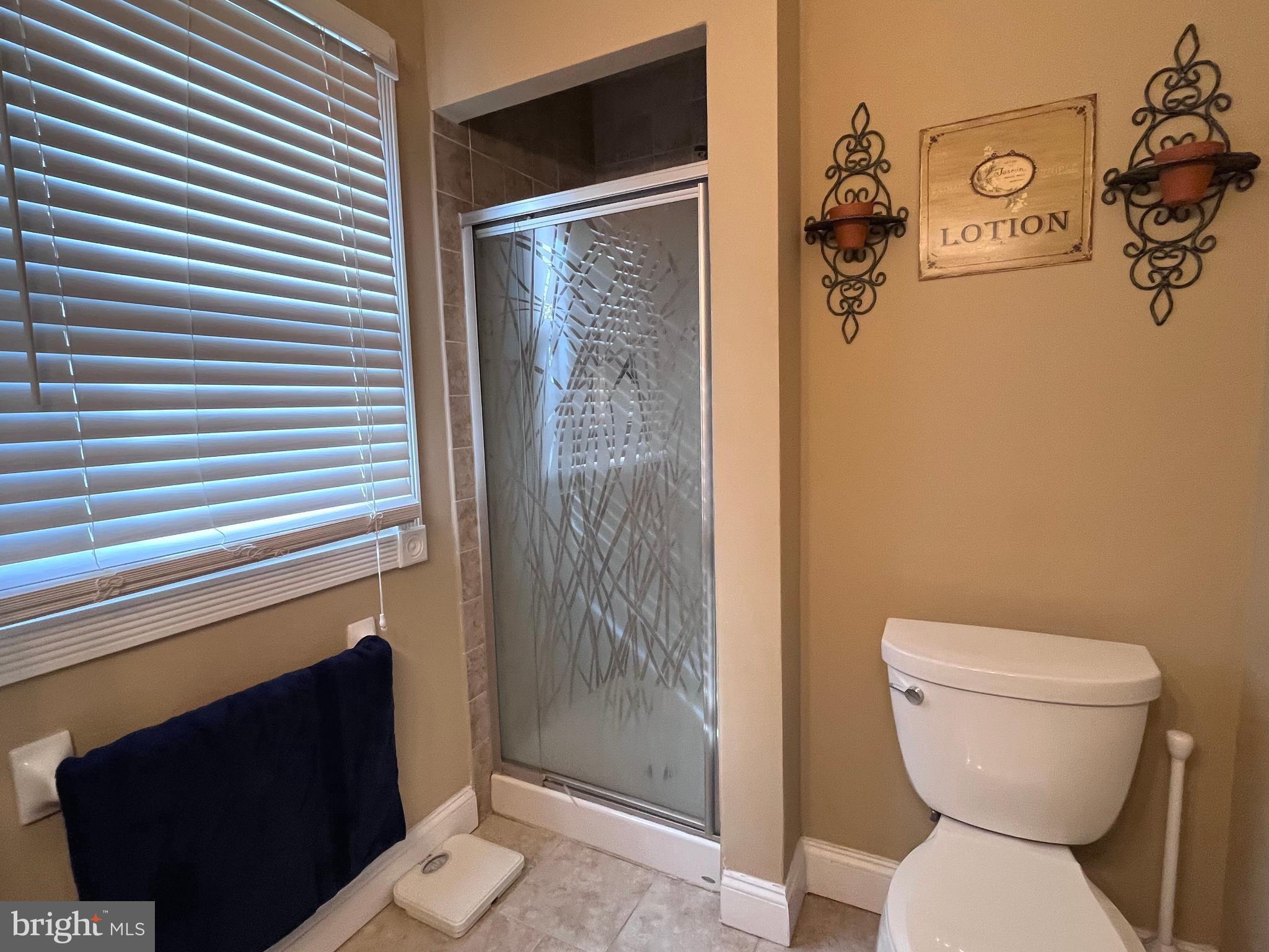 145 Joanne Road Holland, PA 18966 - Photo 38 of 54 a bathroom with a toilet and a shower