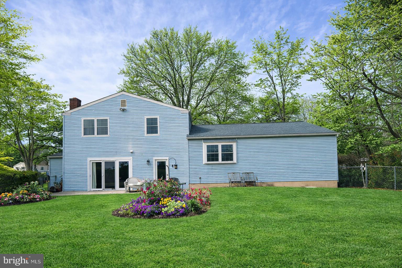 145 Joanne Road Holland, PA 18966 - Photo 52 of 54 a front view of house with yard and green space