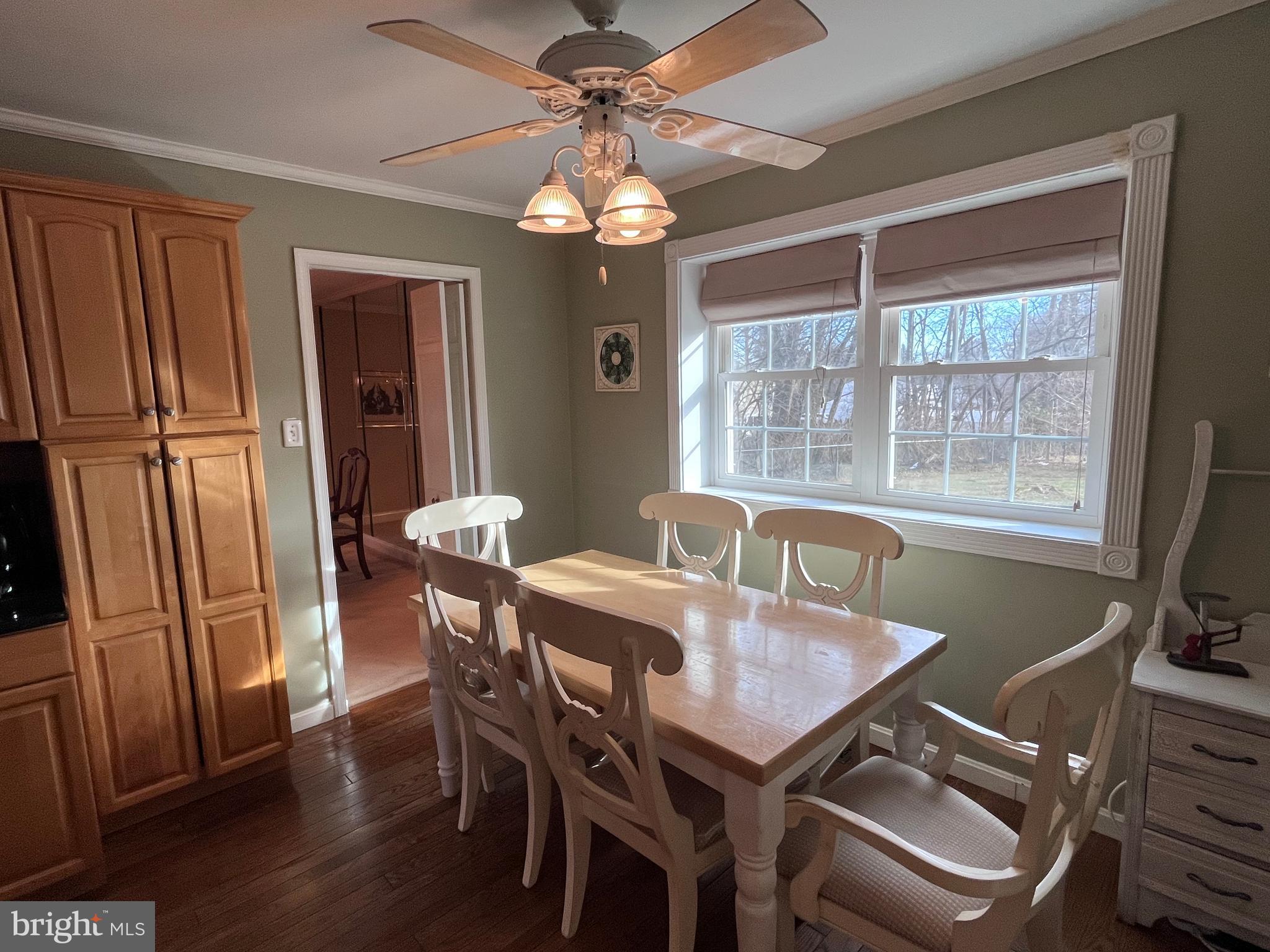 145 Joanne Road Holland, PA 18966 - Photo 6 of 54 a view of a dining room with furniture window and wooden floor
